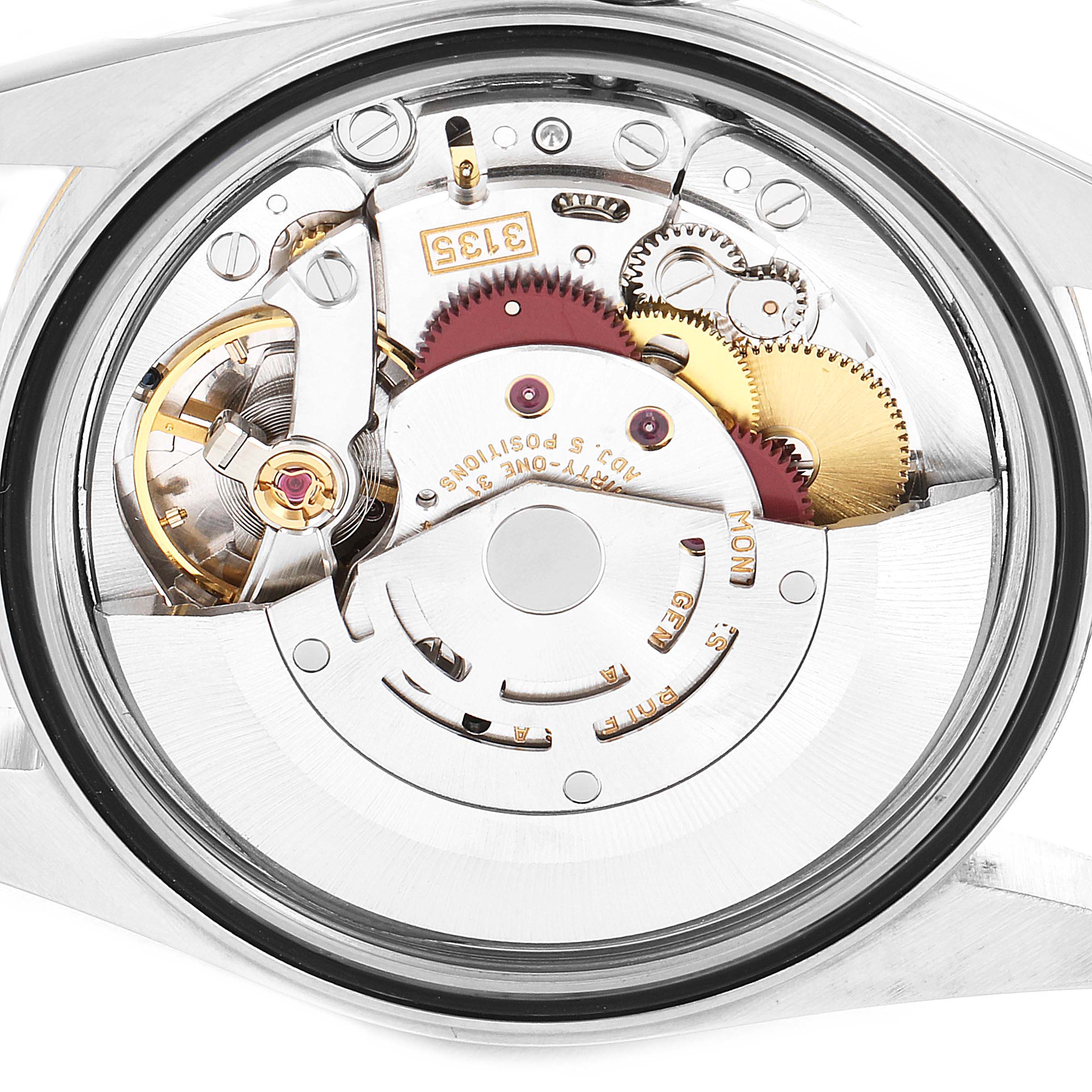 This image shows the internal mechanism and movement components of a Rolex Datejust 16233 Men's Steel and Gold (two tone) Black Dial 16233 Men's Steel and Gold (two tone) Black Dial watch from a close-up angle.