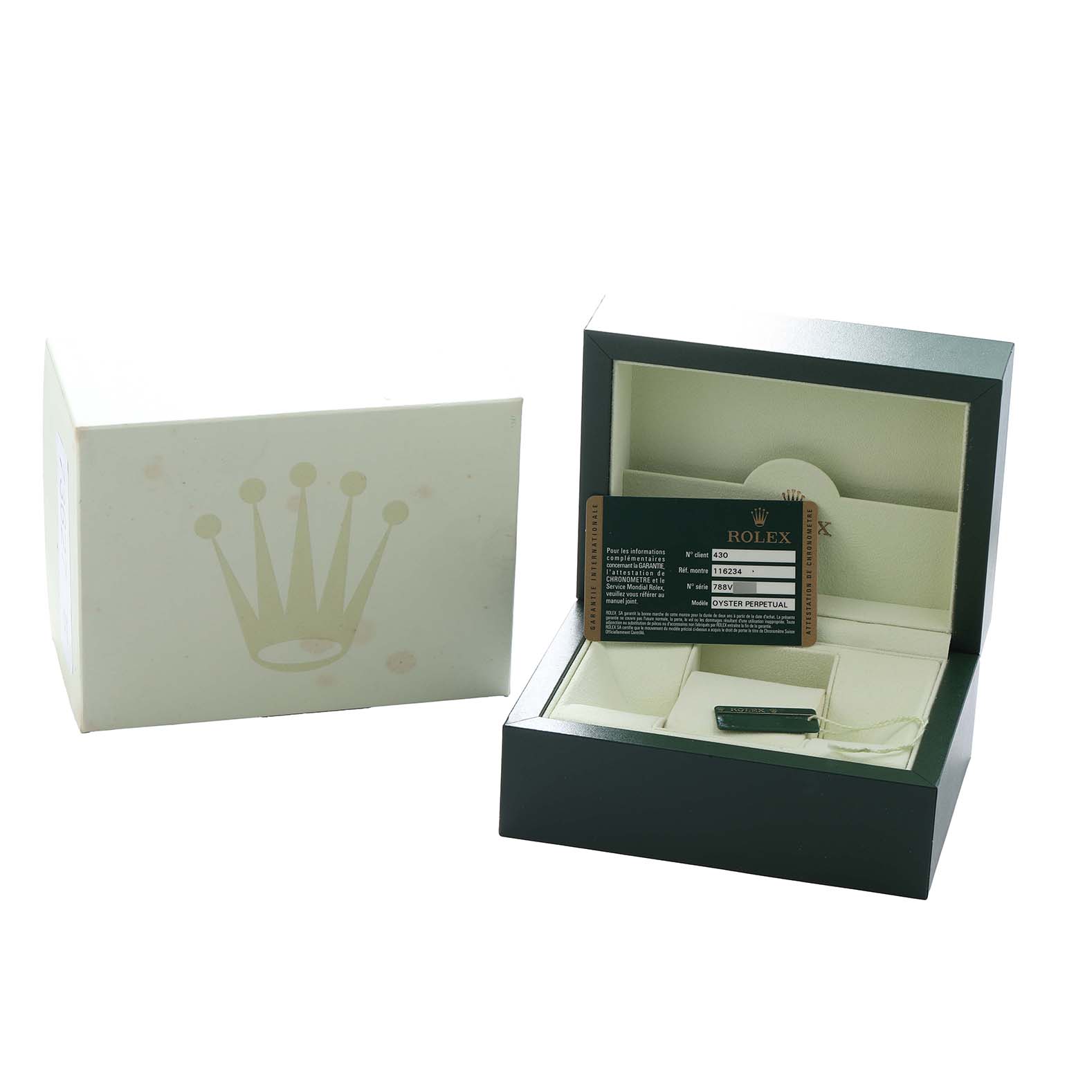 The image shows a Rolex Datejust 116234 Men
s Stainless Steel Silver Dial watch box at an angle, open with warranty card and accessories visible inside.