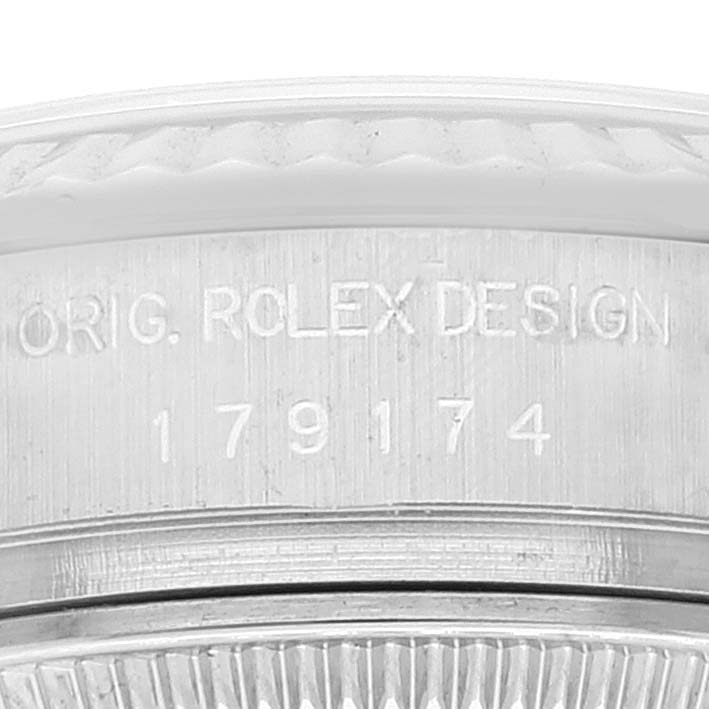 Close-up of the model number and "ORIG. ROLEX DESIGN" engraving on the case back of a Rolex Datejust 179174 Women's Stainless Steel White Dial 179174 Women's Stainless Steel White Dial watch.