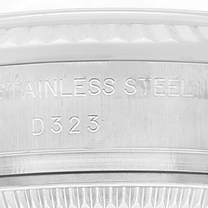This image shows the side of the bezel and the inner inscription on a stainless steel Rolex Datejust 179174 Women's Stainless Steel White Dial 179174 Women's Stainless Steel White Dial watch.