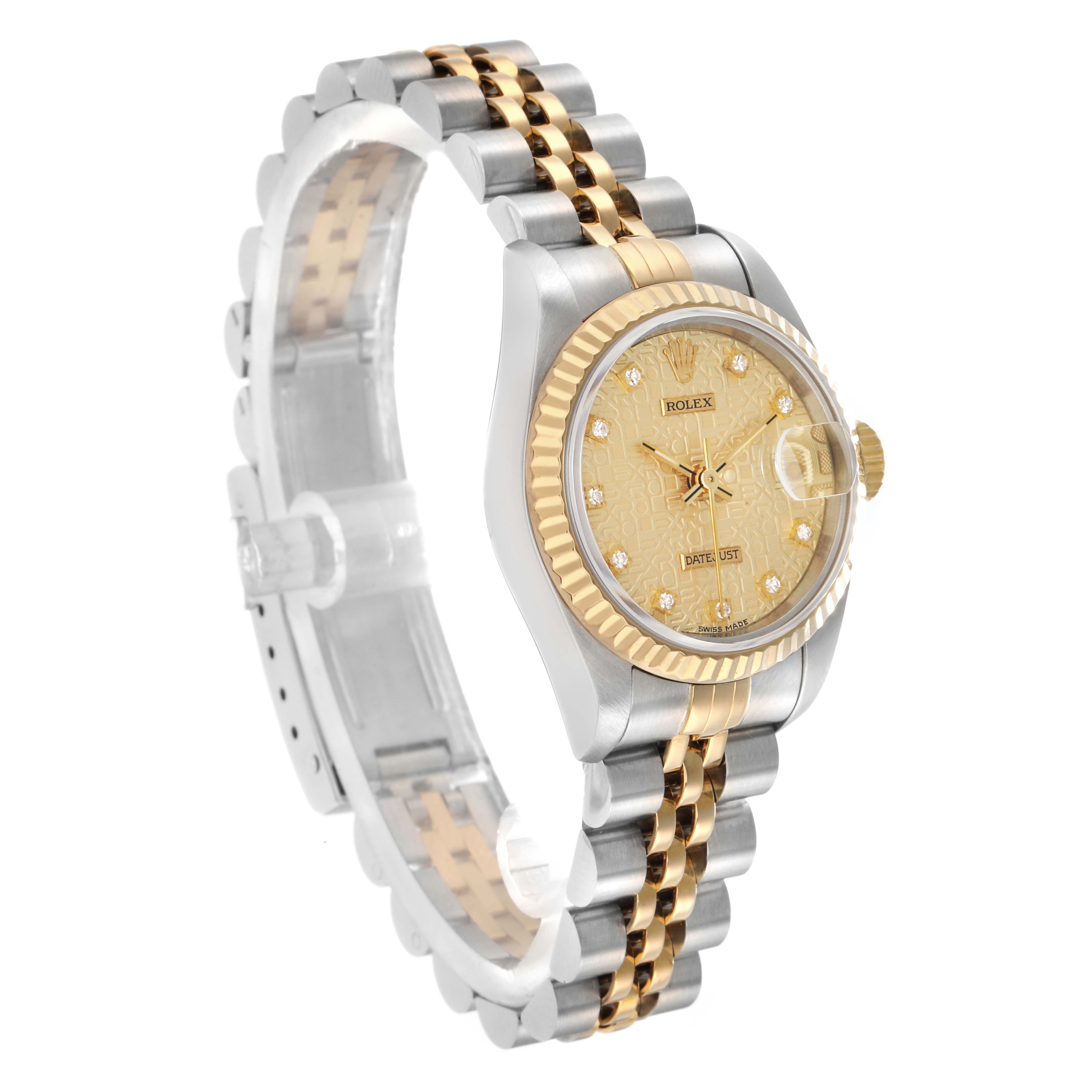 The Rolex Datejust 69173 Women
s Steel and Gold (two tone) Champagne Dial watch is angled to show the gold-toned dial, diamond hour markers, fluted bezel, and two-tone bracelet.