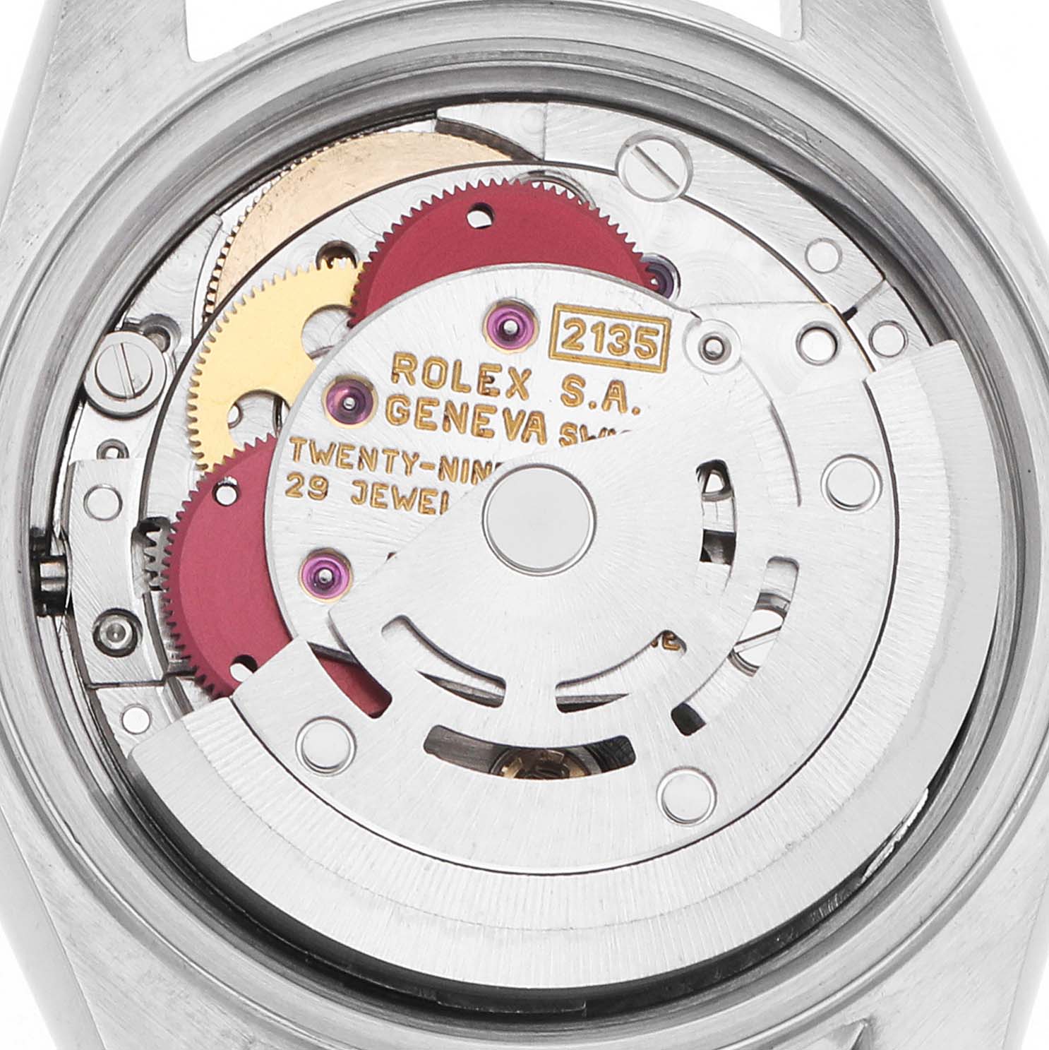 The image shows the movement of a Rolex Datejust 69173 Women
s Steel and Gold (two tone) Champagne Dial watch, viewed from the back, highlighting gears and the rotor.