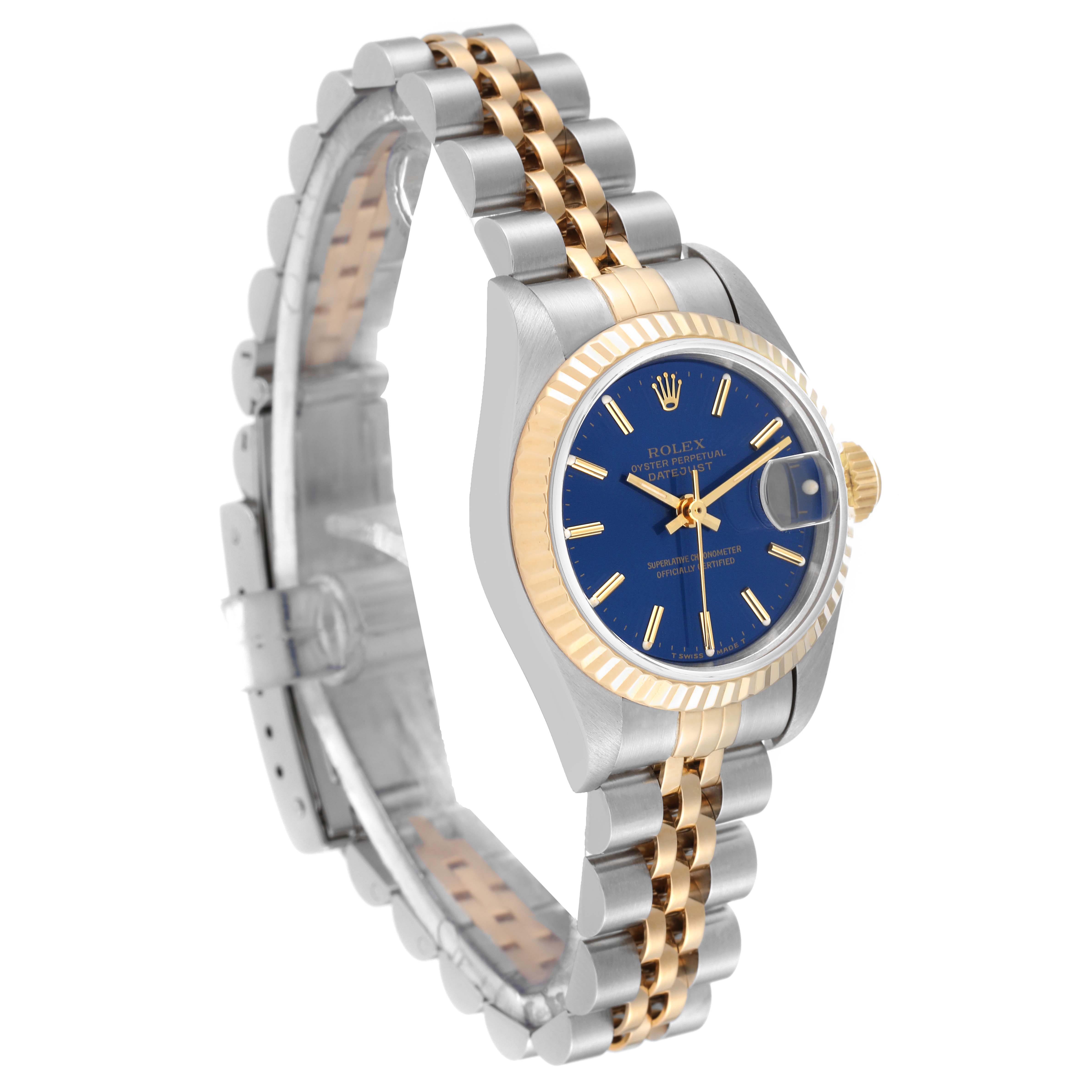 The image shows a Rolex Datejust 69173 Women's Steel and Gold (two tone) Blue Dial 69173 Women's Steel and Gold (two tone) Blue Dial watch from an angled perspective, highlighting its blue dial, fluted bezel, and two-tone bracelet.