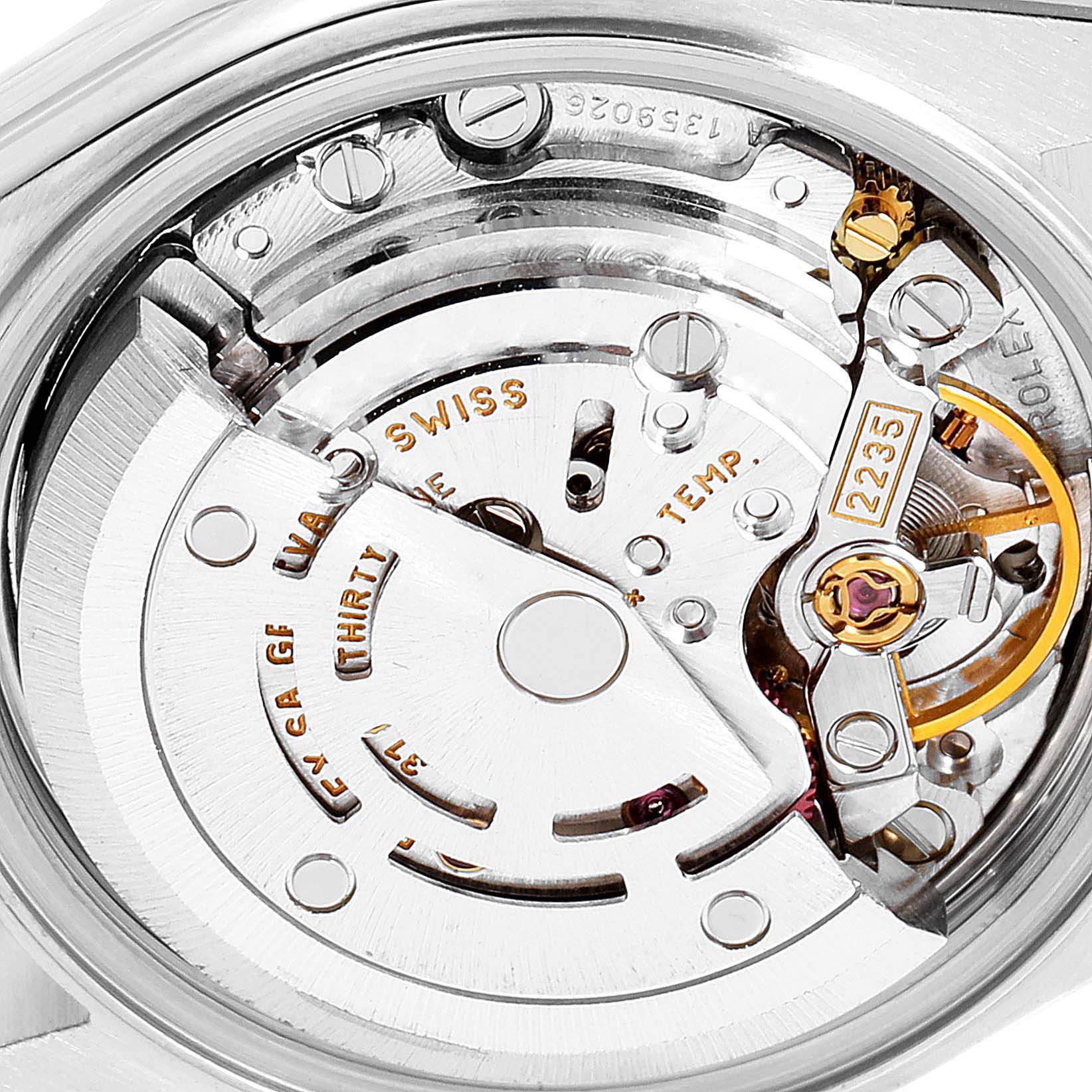 This image shows the inner mechanical movement of a Rolex Datejust 79173 Women's Steel and Gold (two tone) Blue Dial 79173 Women's Steel and Gold (two tone) Blue Dial watch, focusing on the automatic rotor and other internal components.