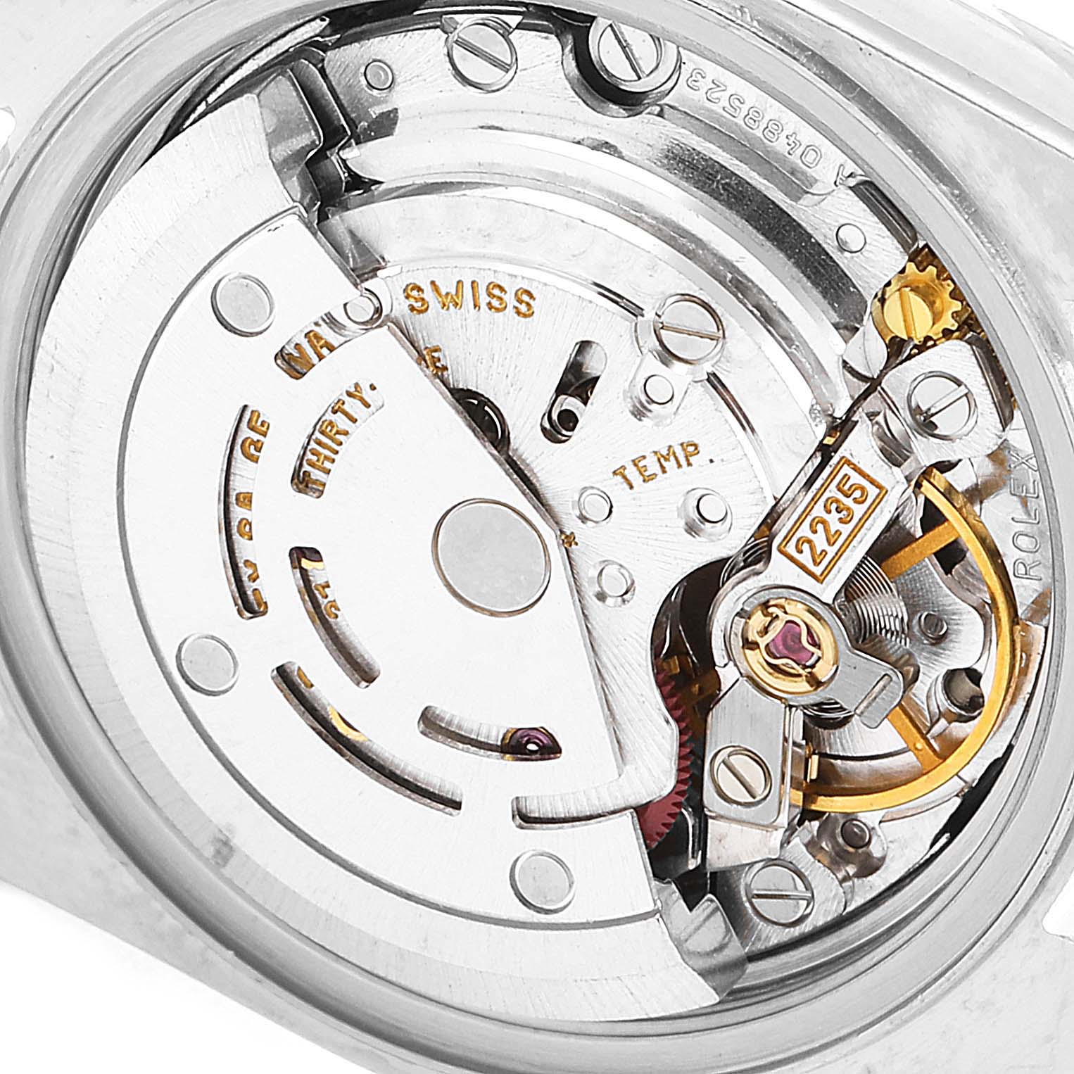 The image shows a detailed view of the movement and internal mechanism of a Rolex Datejust 79163 Women's Steel and Gold (two tone) Champagne Dial 79163 Women's Steel and Gold (two tone) Champagne Dial watch.