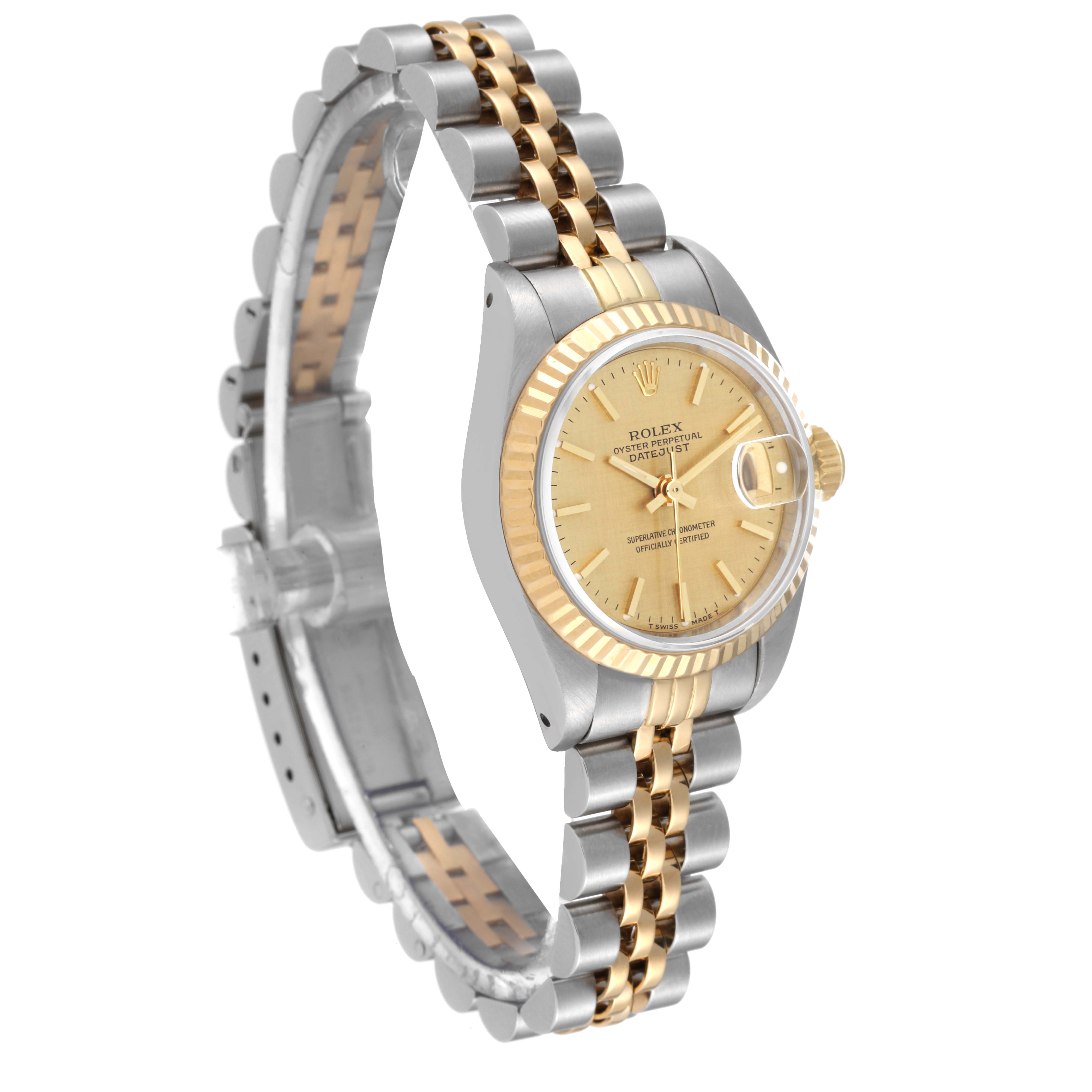 The Rolex Datejust 69173 Women
s Steel and Gold (two tone) Champagne Dial 69173 Women
s Steel and Gold (two tone) Champagne Dial watch is shown at an angle highlighting the face, bezel, and two-tone bracelet.