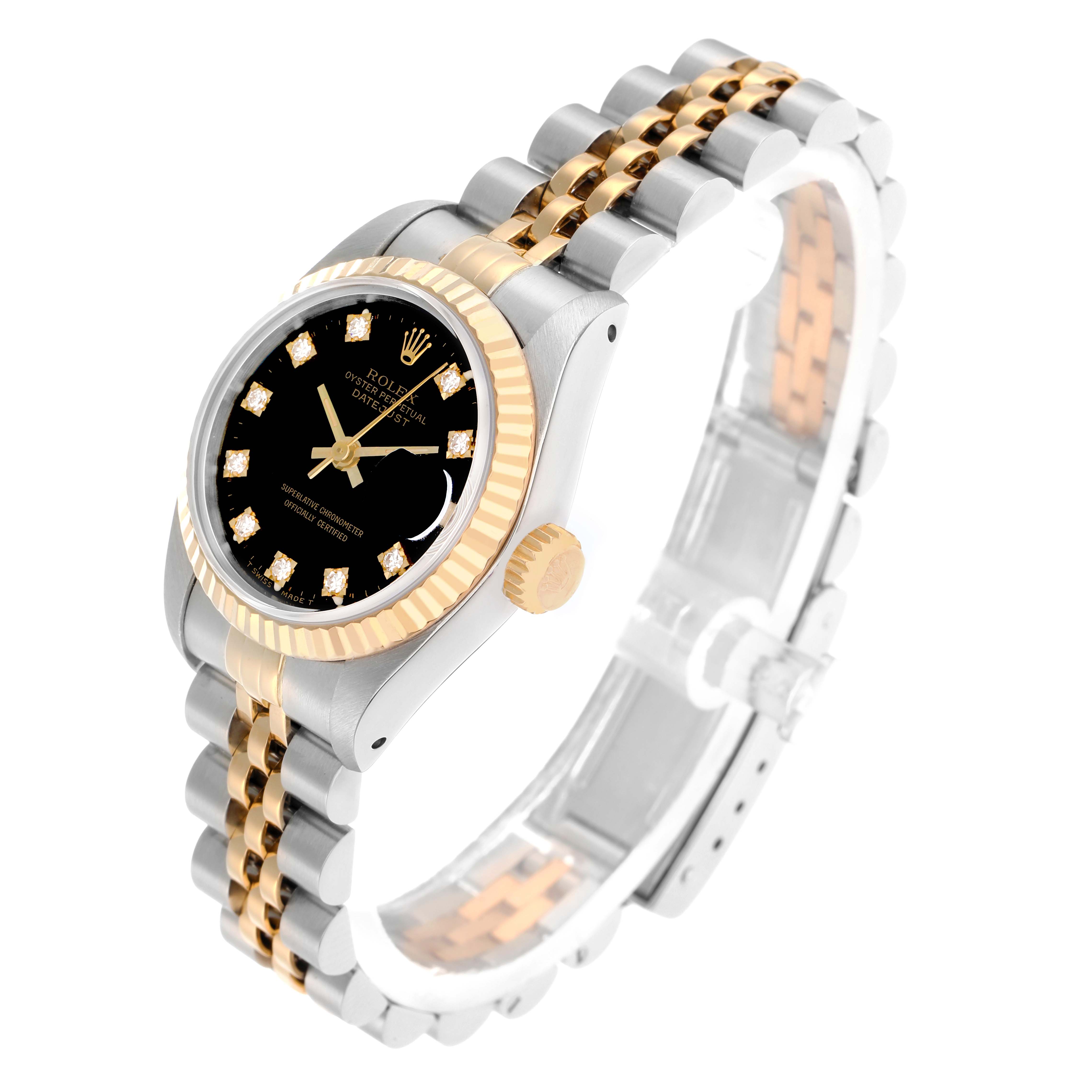 The Rolex Datejust 69173 Women
s Steel and Gold (two tone) Black Dial watch is shown at an angle highlighting the face, crown, fluted bezel, and two-tone Jubilee bracelet.