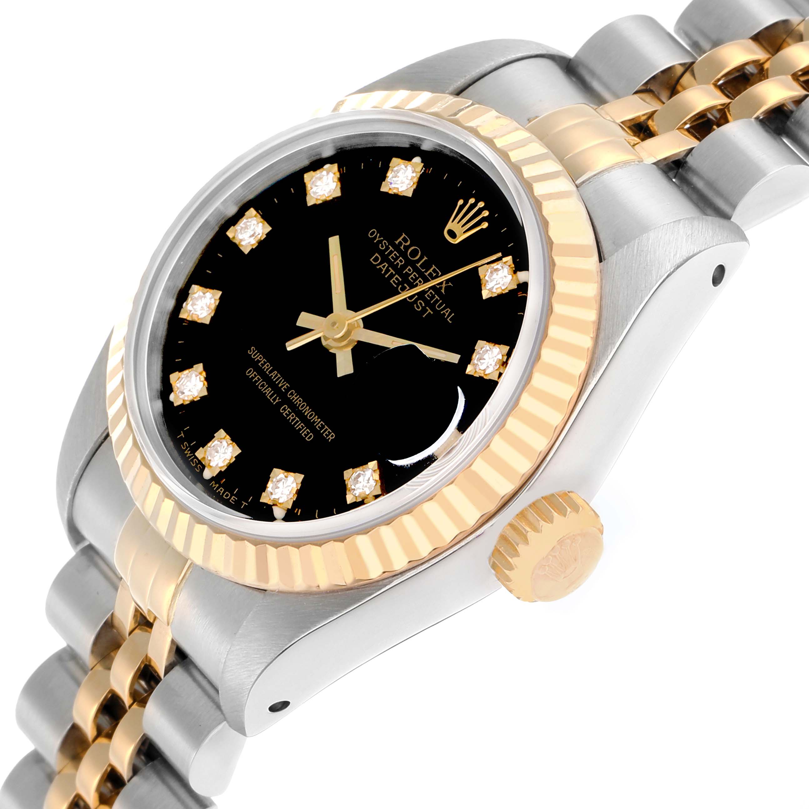 The Rolex Datejust 69173 Women
s Steel and Gold (two tone) Black Dial watch is shown at an angle highlighting the black dial, diamond markers, gold fluted bezel, and two-tone bracelet.