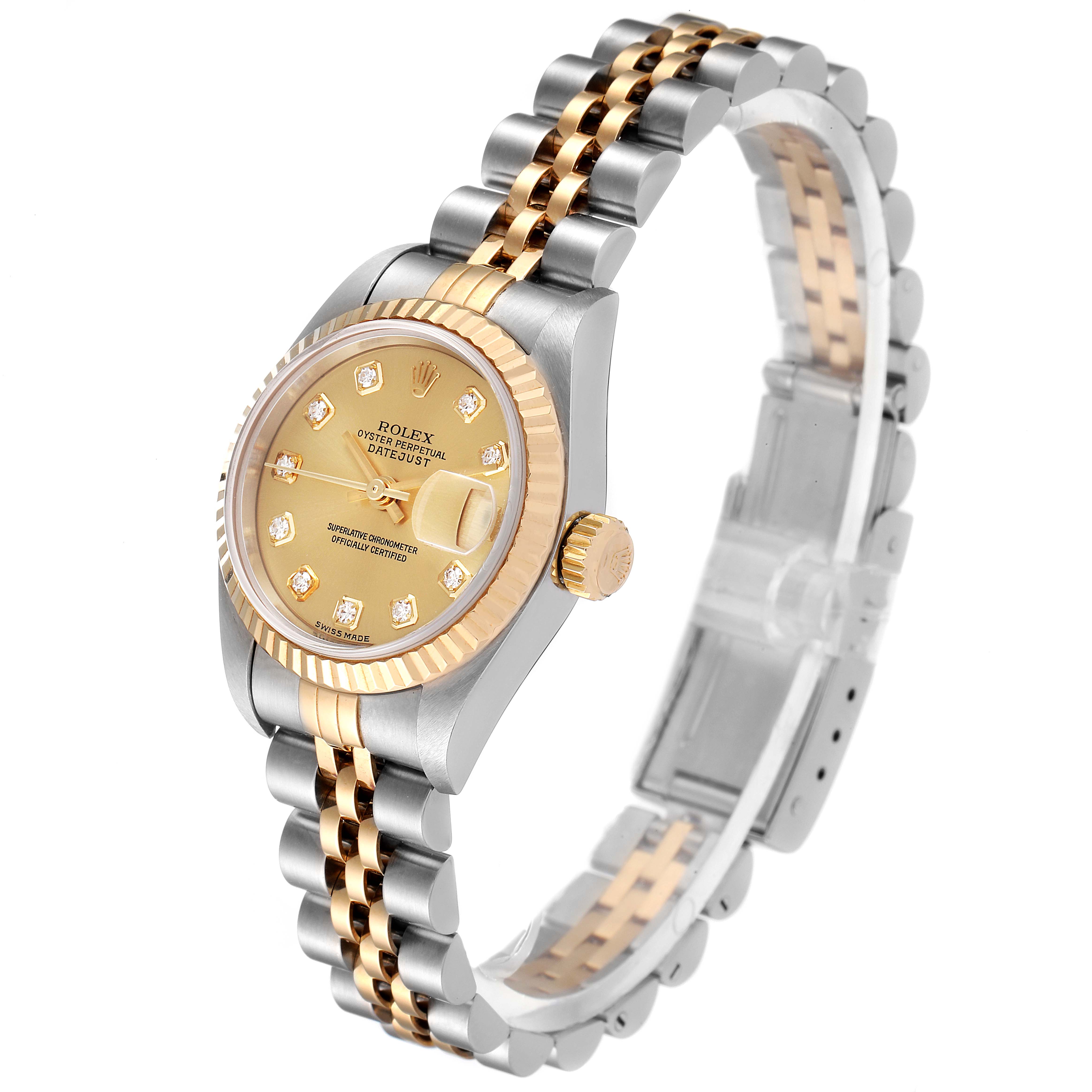 This Rolex Datejust 79173 Women's Steel and Gold (two tone) Champagne Dial 79173 Women's Steel and Gold (two tone) Champagne Dial watch is shown at an oblique angle showcasing its dial, bezel, and two-tone bracelet.