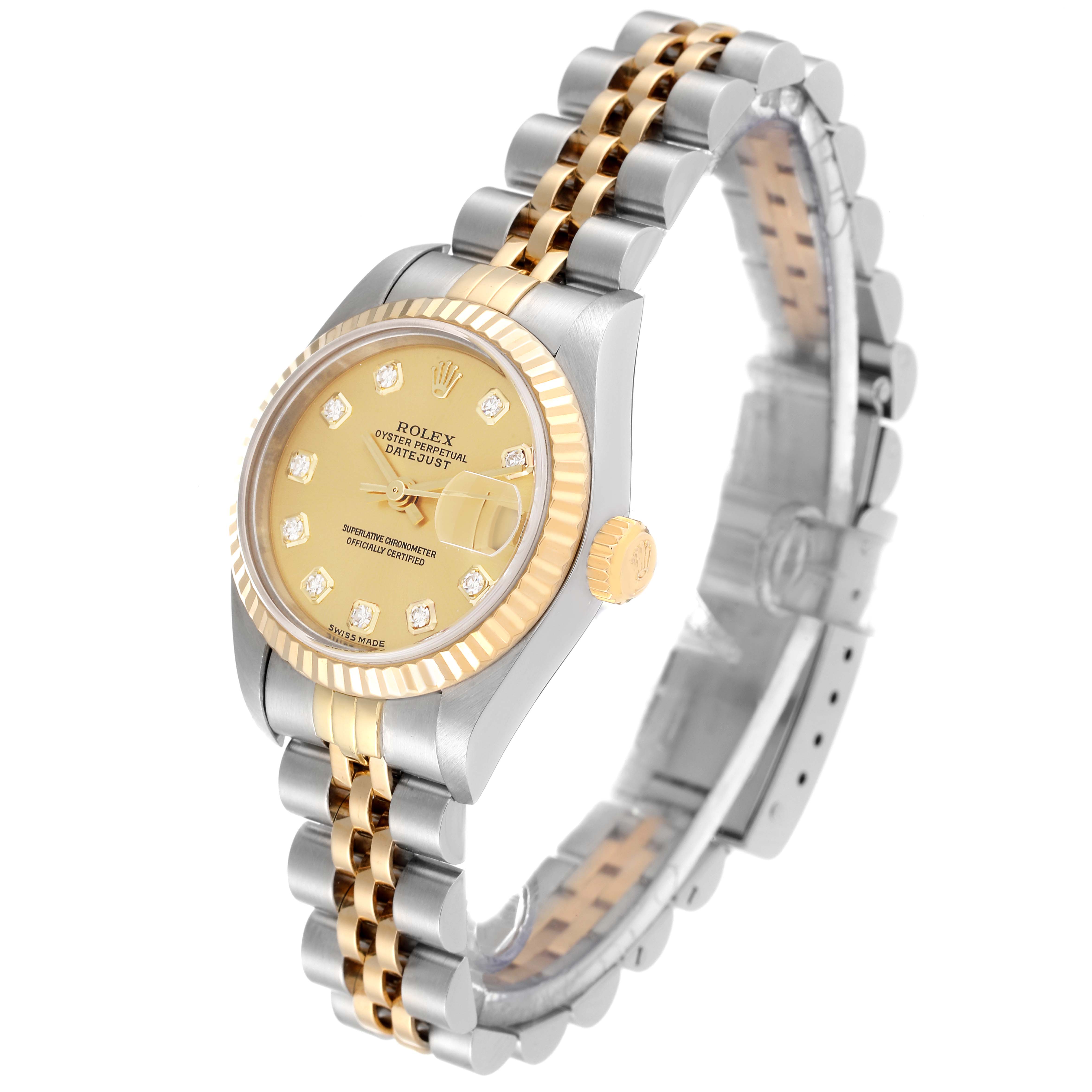 This image shows a side angle of a Rolex Datejust 79173 Women's Steel and Gold (two tone) Champagne Dial 79173 Women's Steel and Gold (two tone) Champagne Dial watch, highlighting its bezel, dial, and two-tone bracelet.
