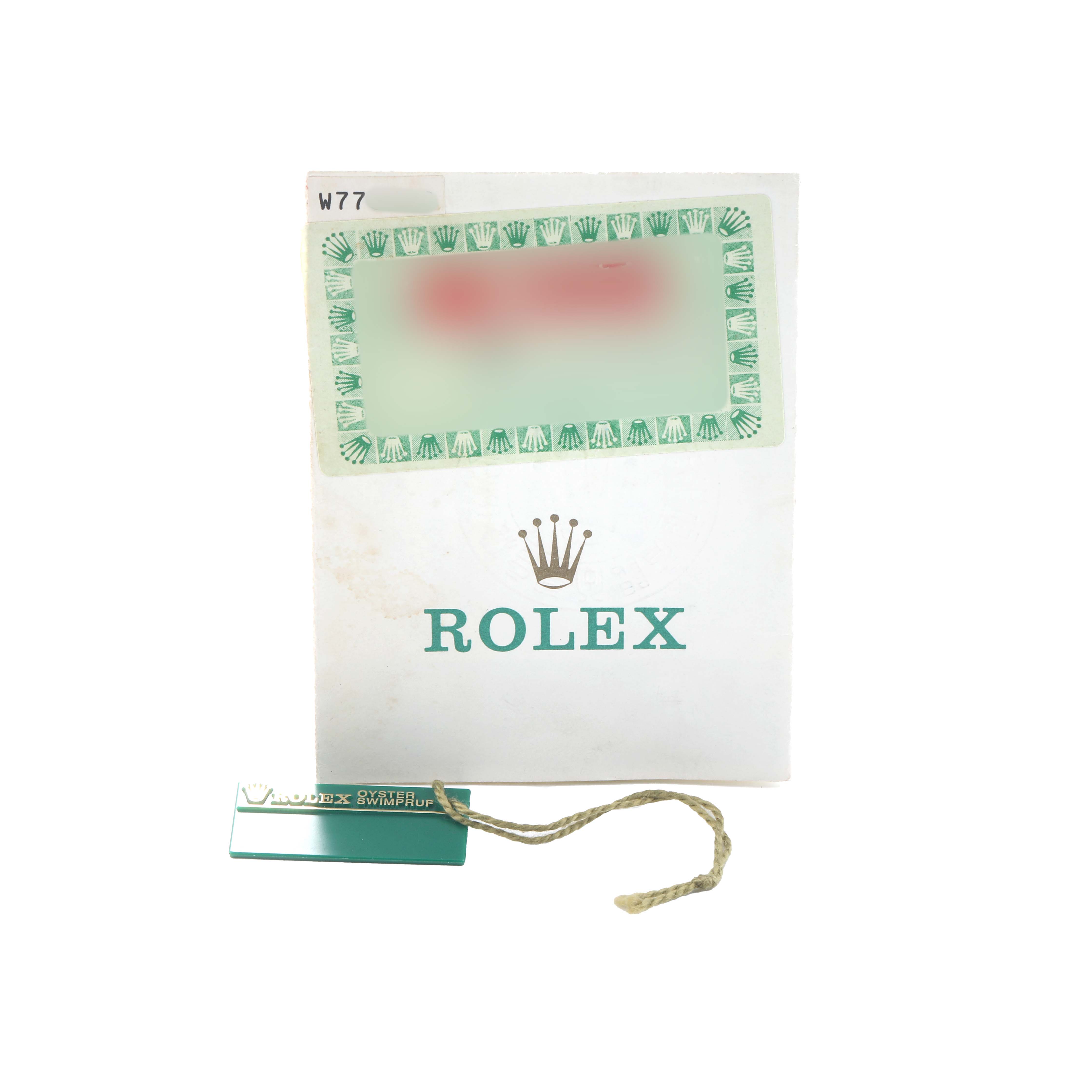 The image shows a Rolex Datejust 69173 Women
s Steel and Gold (two tone) White Dial warranty card holder and tag, viewed from the front.