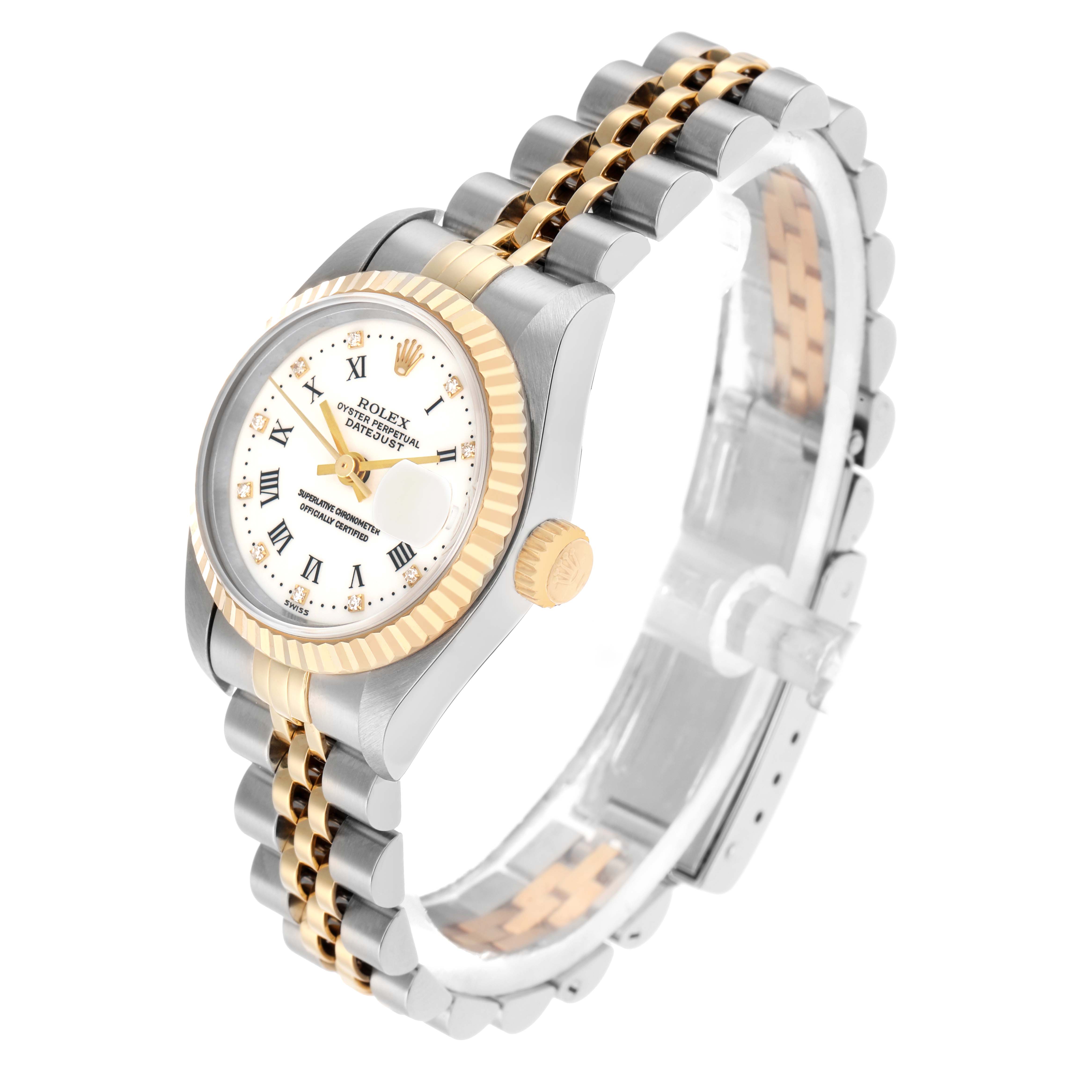 The Rolex Datejust 69173 Women
s Steel and Gold (two tone) White Dial watch is shown at an angle highlighting the two-tone bracelet, fluted bezel, and white dial with Roman numerals.