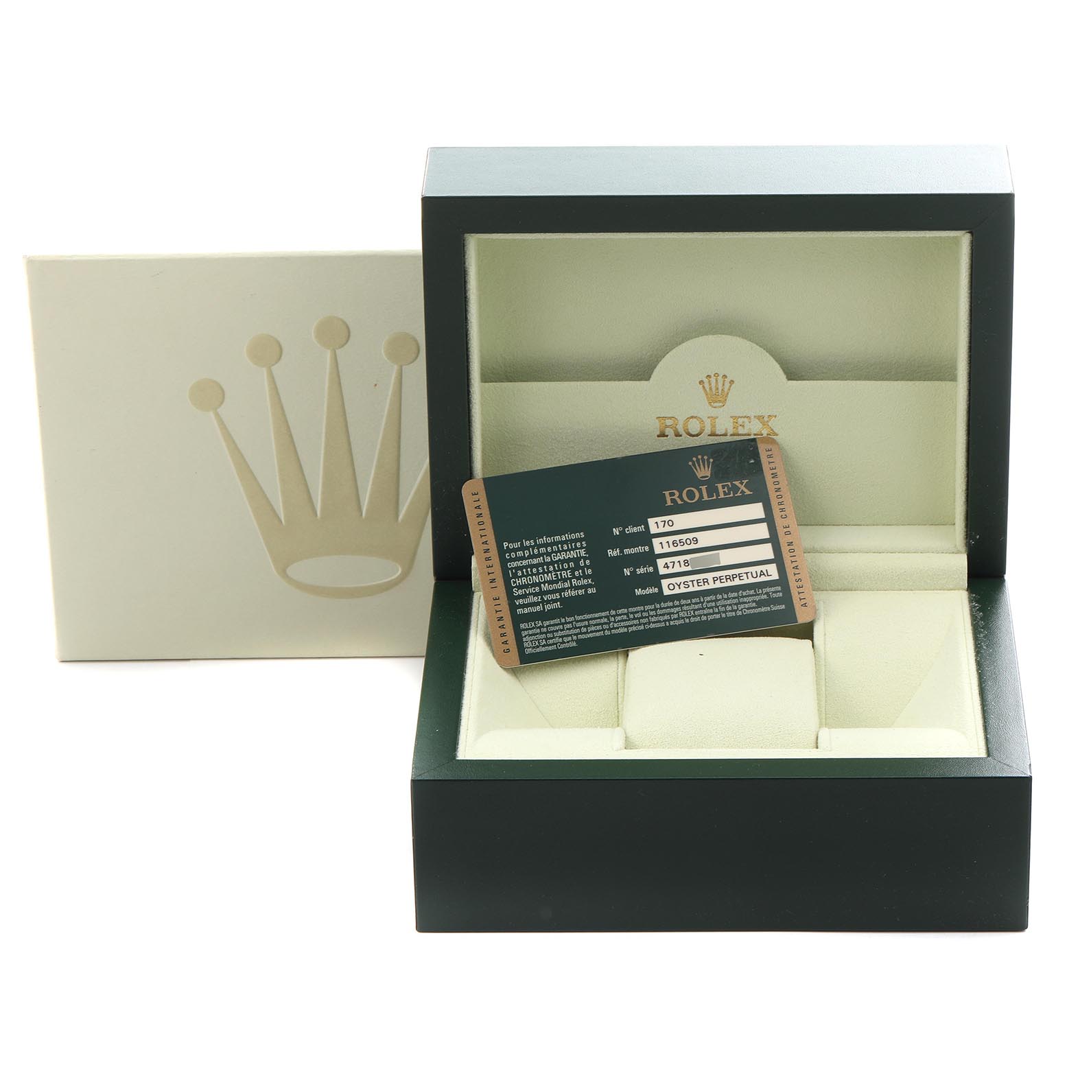 The image shows a Rolex Daytona 116509 Men
s White Gold Silver Dial watch box and warranty card, with the box open and card placed upright inside.