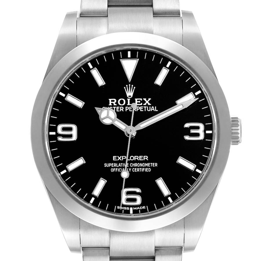 The Rolex Explorer 214270 Men's Stainless Steel Black Dial watch is shown from the front, displaying its black dial, silver hour markers, hands, and part of the bracelet.