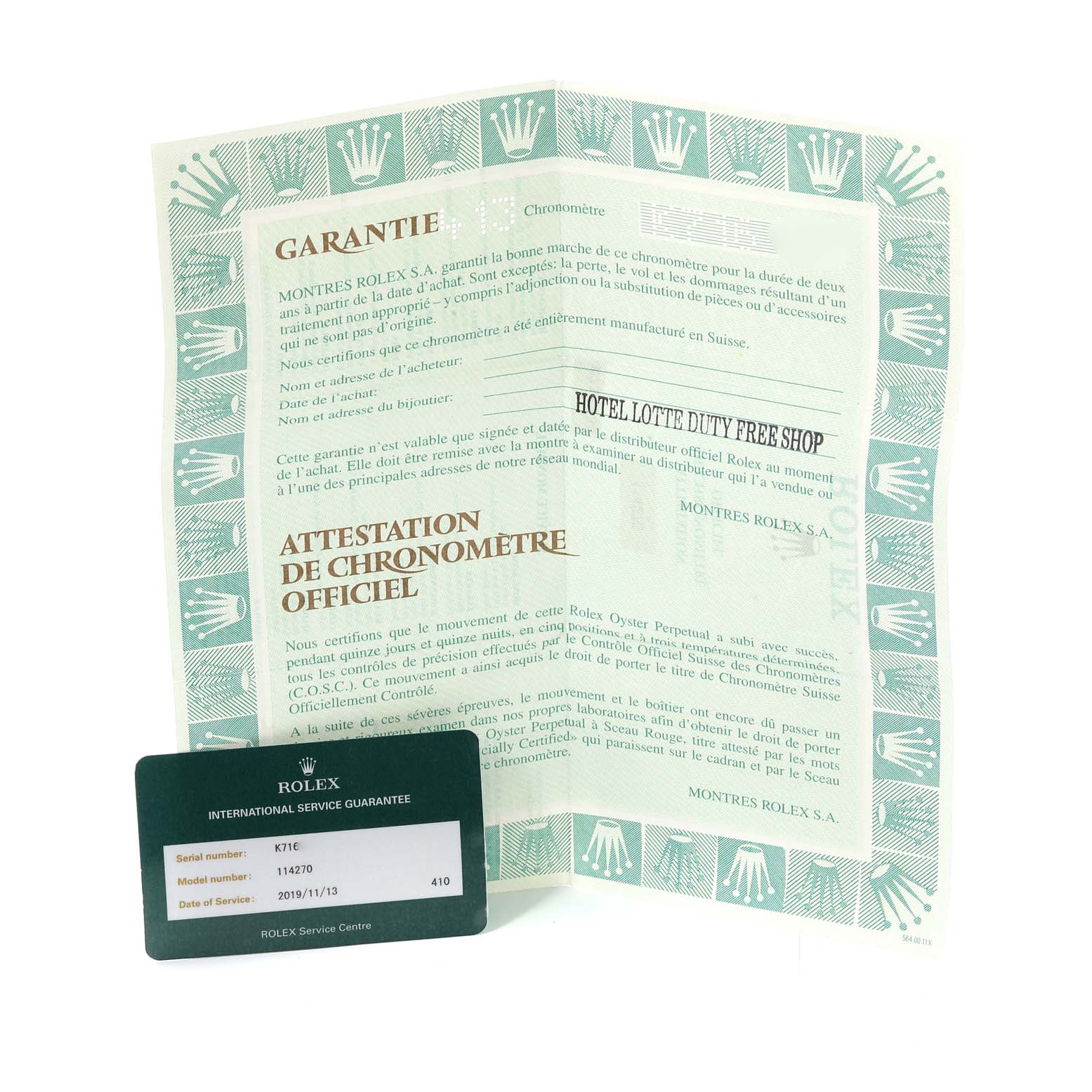 The image shows a warranty document and a guarantee card for the Explorer model by Rolex.