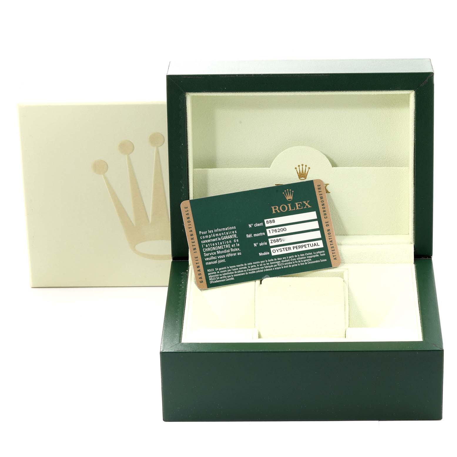 This image shows the open box and warranty card of a Rolex Oyster Perpetual 176200 Women's Stainless Steel Black Dial 176200 Women's Stainless Steel Black Dial watch.
