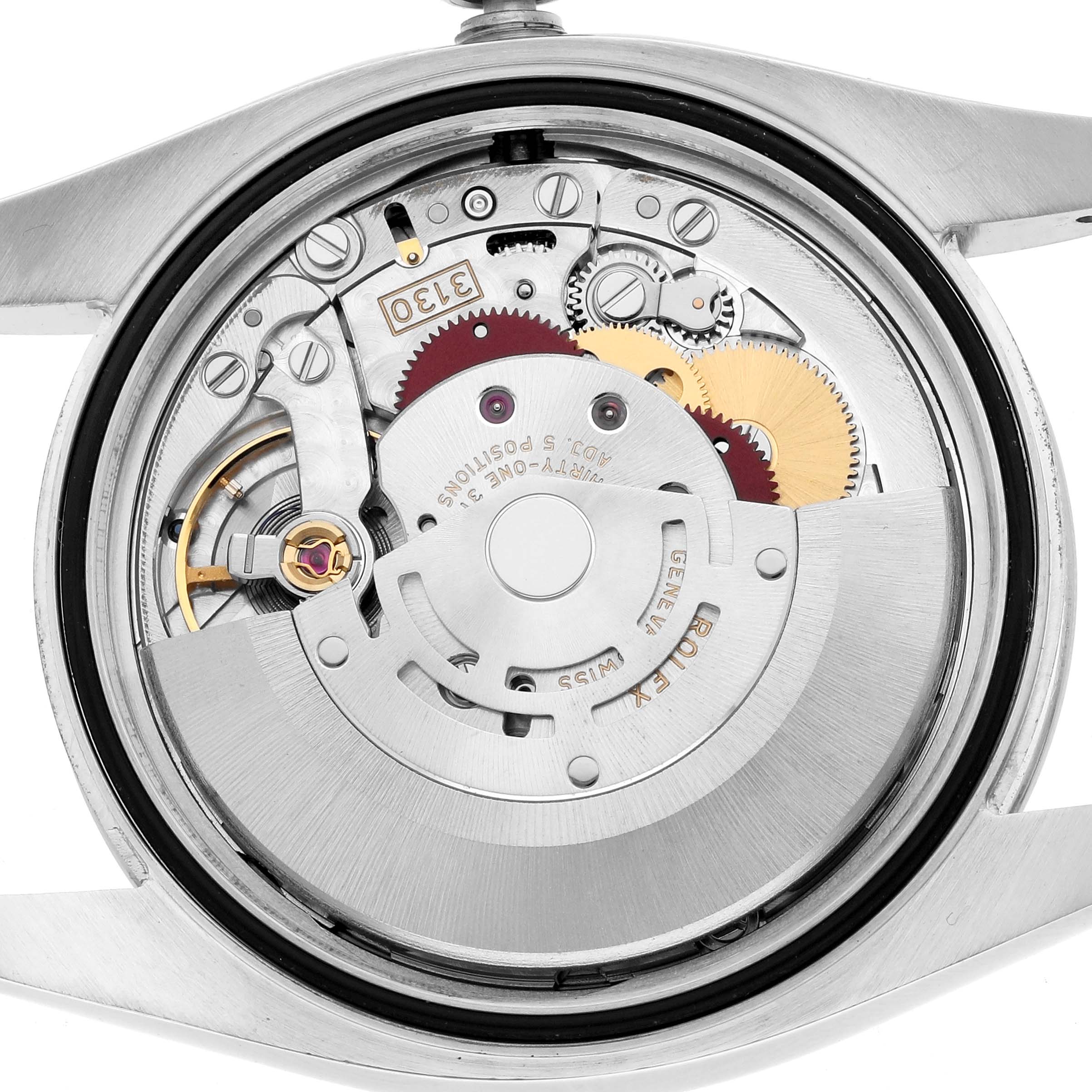The image shows the movement of a Rolex Oyster Perpetual 116000 Men
s Stainless Steel Silver Dial watch from the rear, highlighting gears and inner mechanisms.