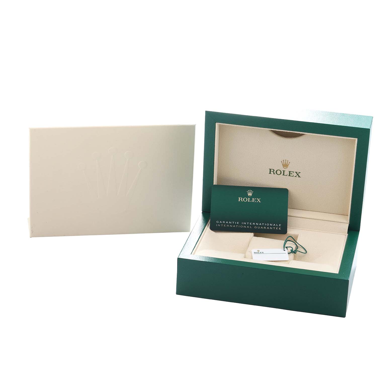The image shows the open box and packaging for a Rolex Oyster Perpetual 124300 Men
s Stainless Steel Silver Dial, featuring a guarantee card and a tag.