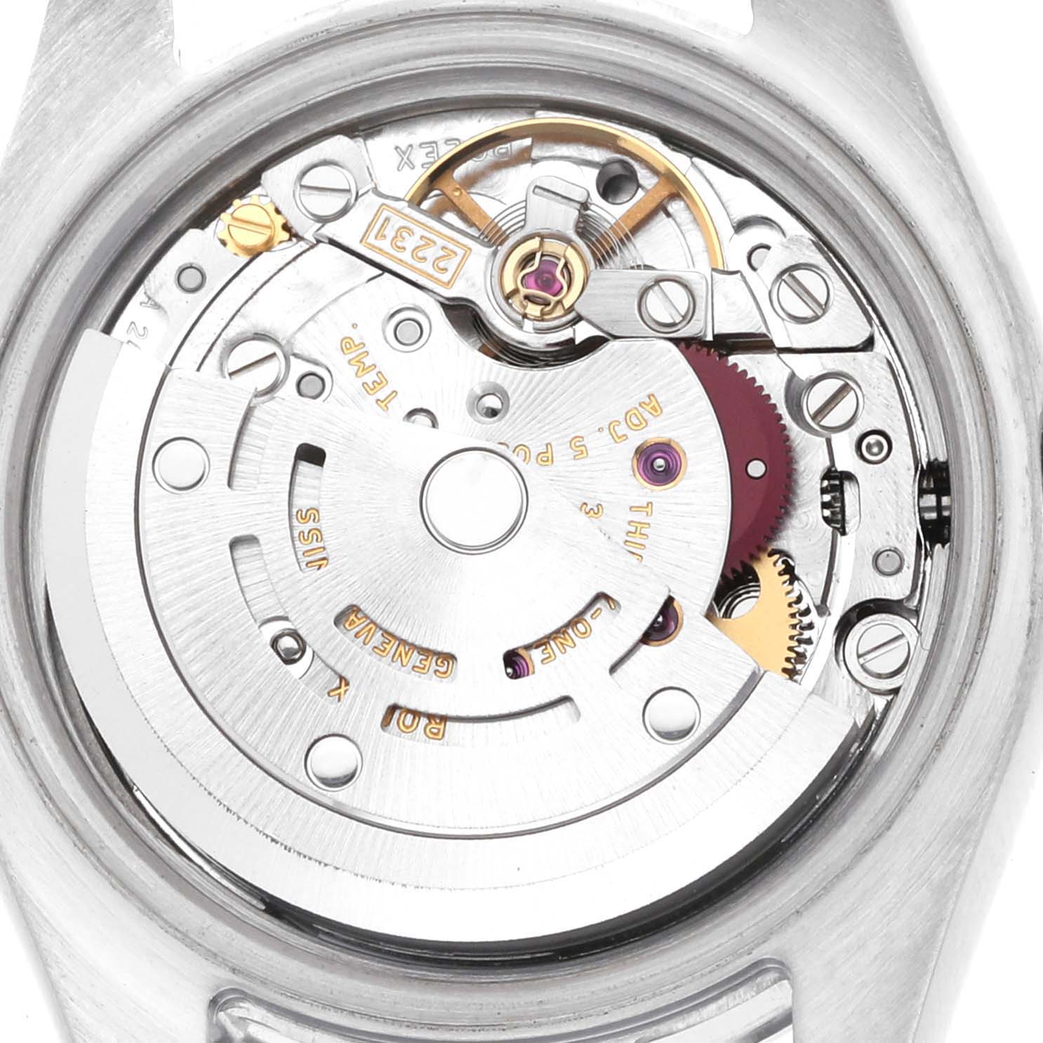 The image shows the movement of the Rolex Oyster Perpetual 176200 Women
s Stainless Steel Silver Dial watch from the back, revealing its intricate gears and rotor.