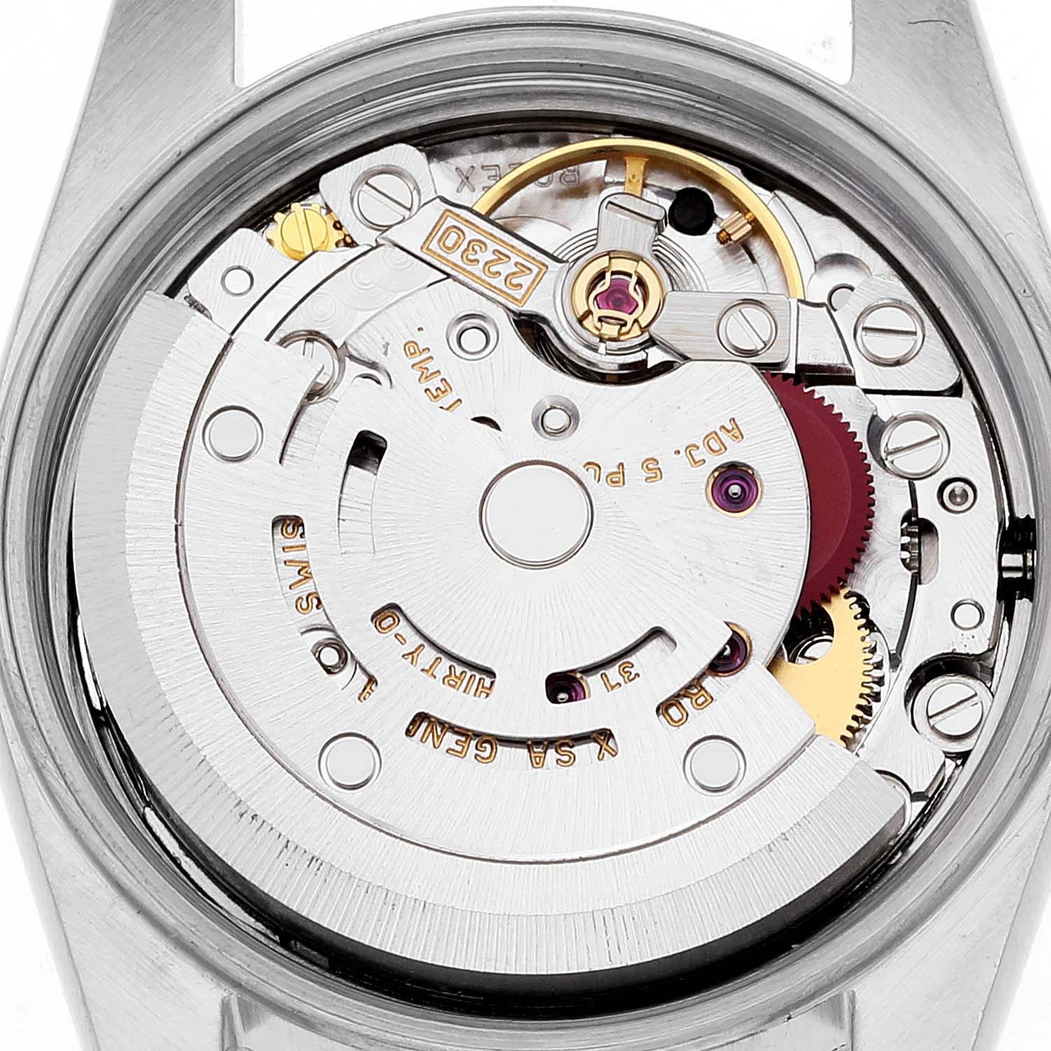 This image shows the movement mechanism and inner components of a Rolex Oyster Perpetual 76193 Women's Steel and Gold (two tone) Black Dial 76193 Women's Steel and Gold (two tone) Black Dial watch in a close-up view.