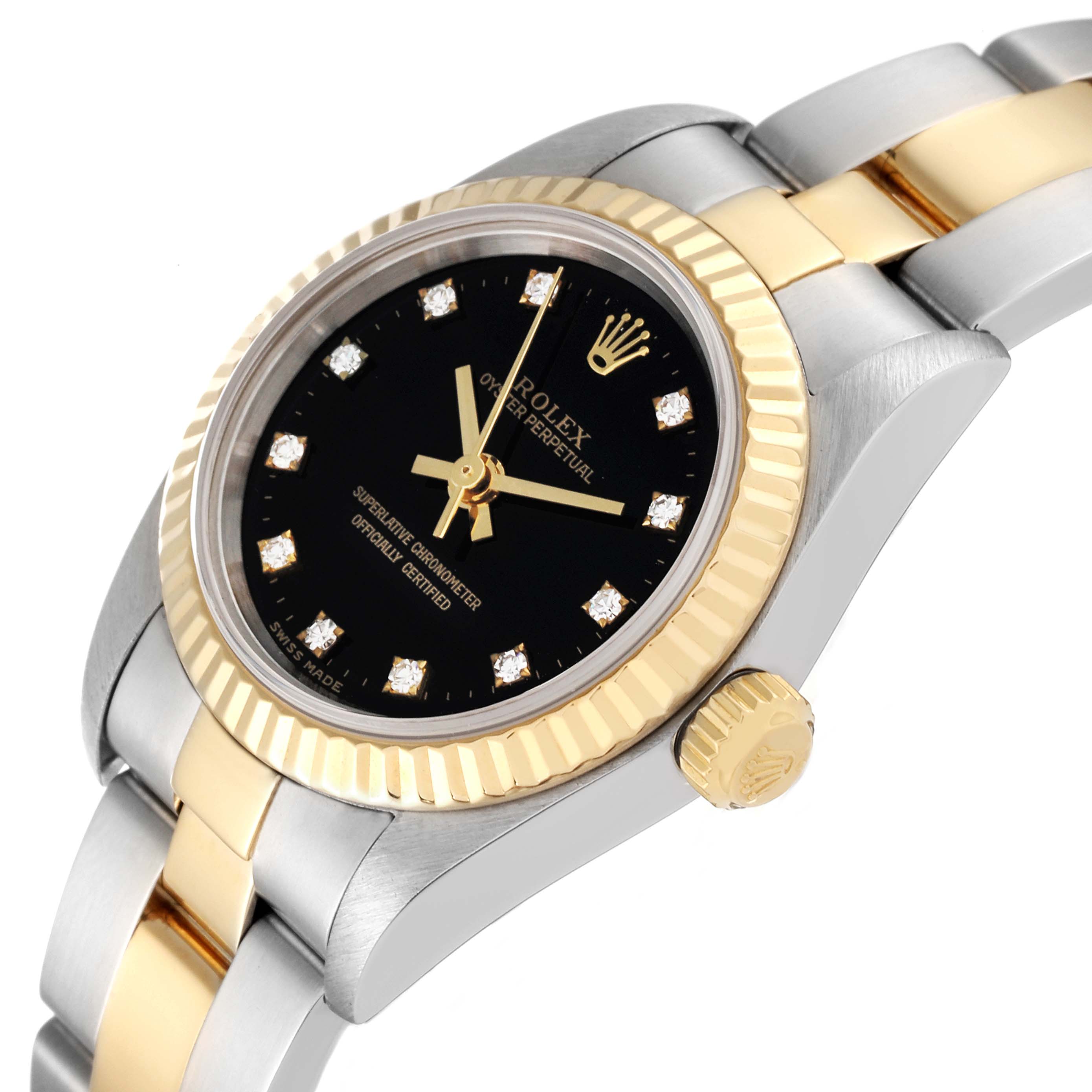 The Rolex Oyster Perpetual 76193 Women's Steel and Gold (two tone) Black Dial 76193 Women's Steel and Gold (two tone) Black Dial watch is shown at an angle highlighting the dial, bezel, crown, and part of the bracelet.
