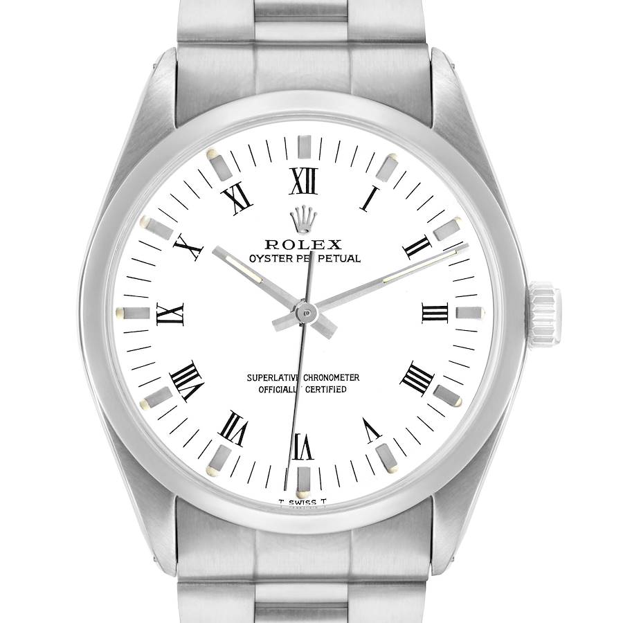 The Rolex Oyster Perpetual 1002 Men's Stainless Steel White Dial watch is shown from a top-down angle, highlighting the face, bezel, and part of the bracelet.