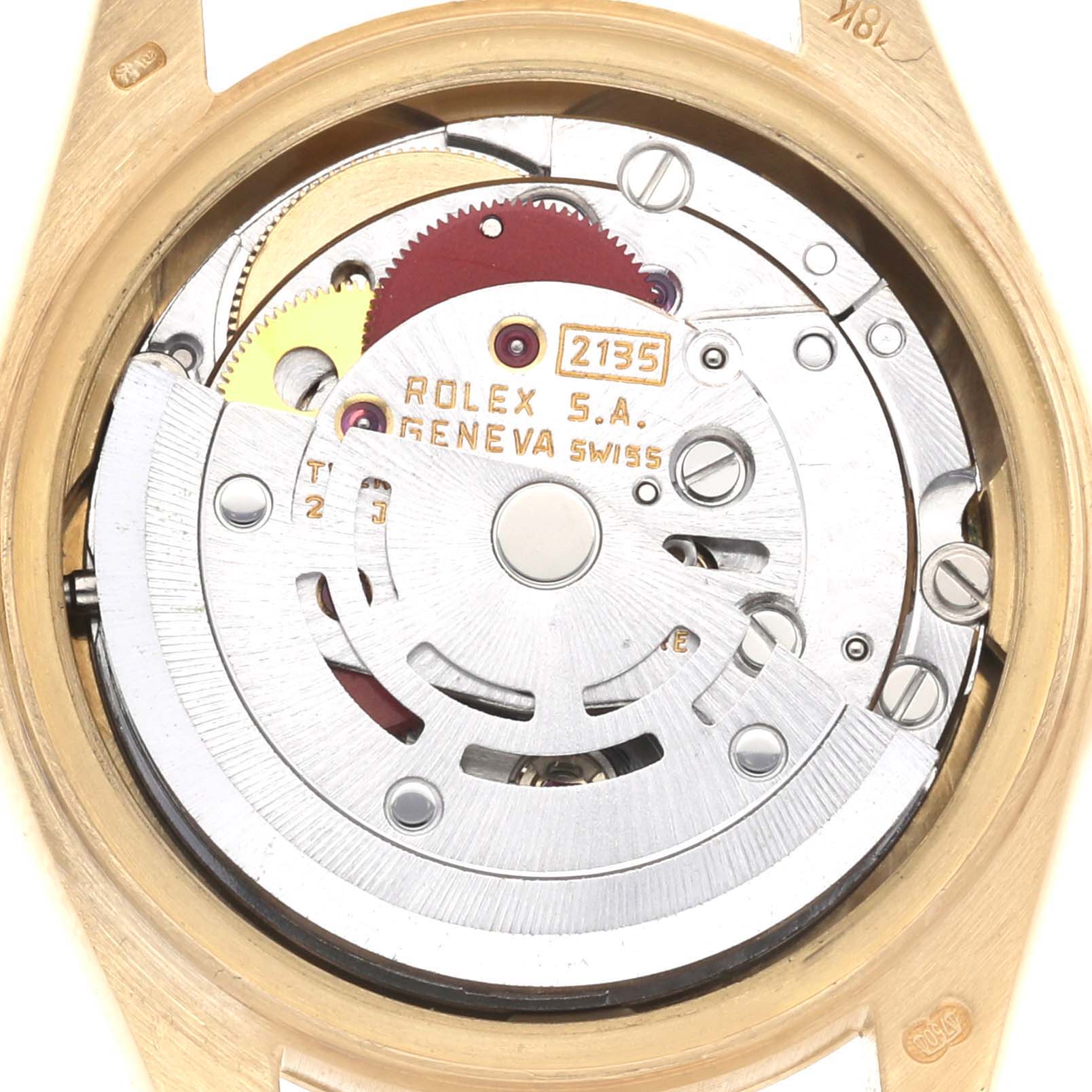 The Rolex President 69178 Women
s Yellow Gold Blue Dial model is shown from the back, revealing its movement and internal mechanical components.