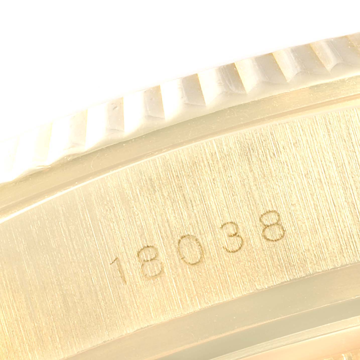 The image shows a close-up of the engraved model number "18038" on the case side of a Rolex President 18038 Men's Yellow Gold White Dial 18038 Men's Yellow Gold White Dial watch.