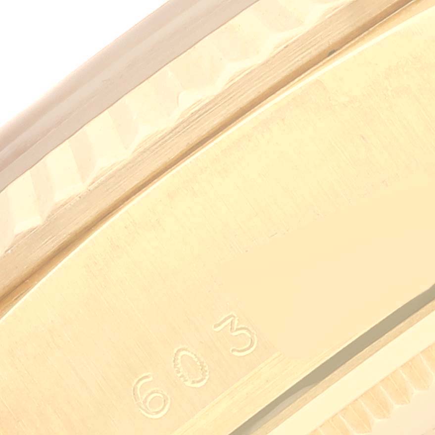 This is a close-up angle showing the fluted bezel and part of the case of a Rolex President 18038 Men
s Yellow Gold Champagne Dial 18038 Men
s Yellow Gold Champagne Dial model watch.