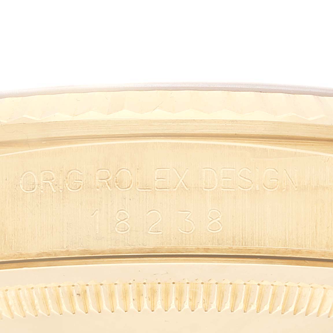 This image shows a close-up of the case side and bezel with the model number "18238" of the Rolex President 18238 Men
s Yellow Gold Champagne Dial 18238 Men
s Yellow Gold Champagne Dial watch.