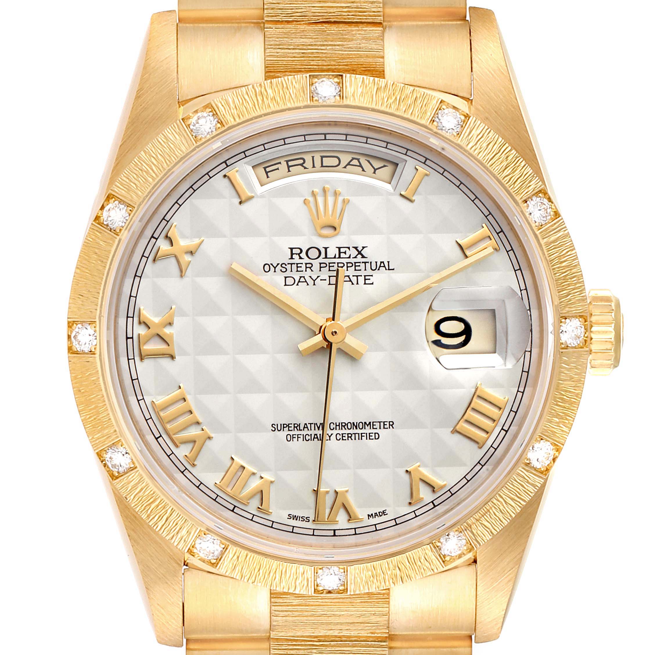 This image shows a close-up of the face and bezel of the Rolex President 18308 Men's Yellow Gold Beige Dial 18308 Men's Yellow Gold Beige Dial Day-Date watch, displaying the day, date, and Roman numerals.