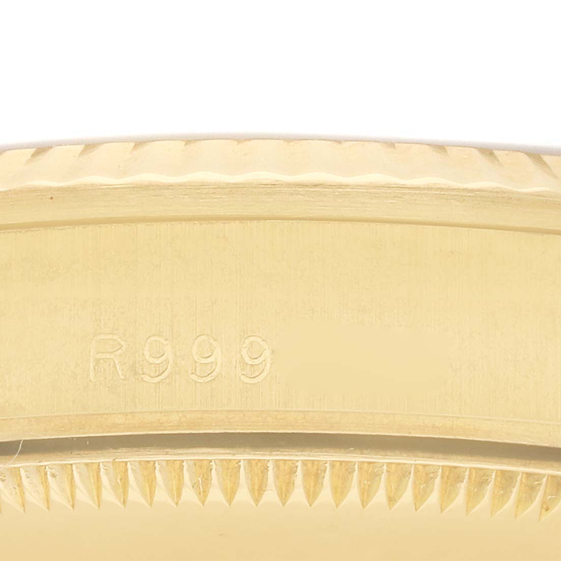 The image shows a close-up of the side view of a Rolex President 68278 Women
s Yellow Gold Blue Dial model, highlighting the case with engraved details.