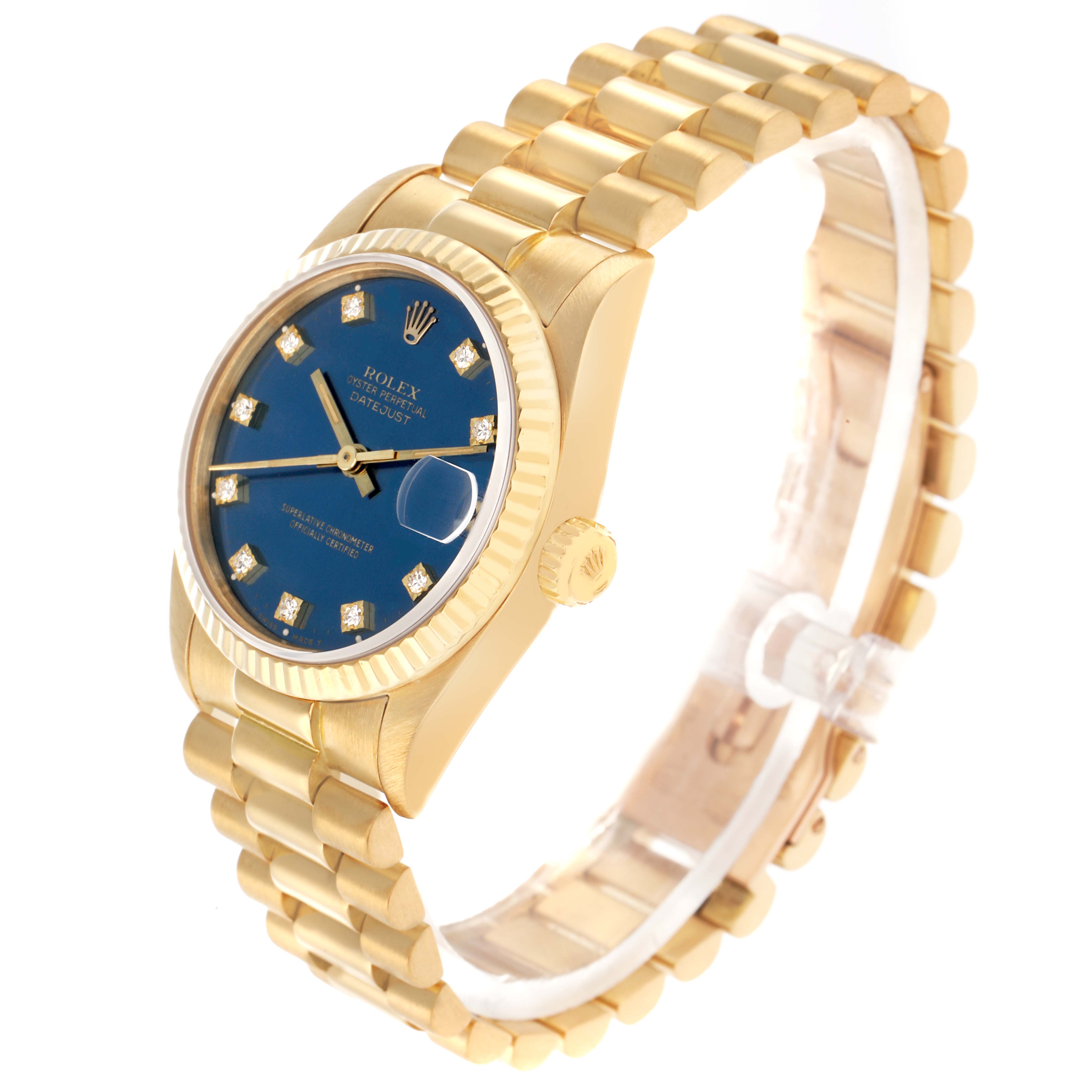 The Rolex President 68278 Women
s Yellow Gold Blue Dial watch is shown at a slight angle, displaying its gold bracelet, blue dial, and fluted bezel.