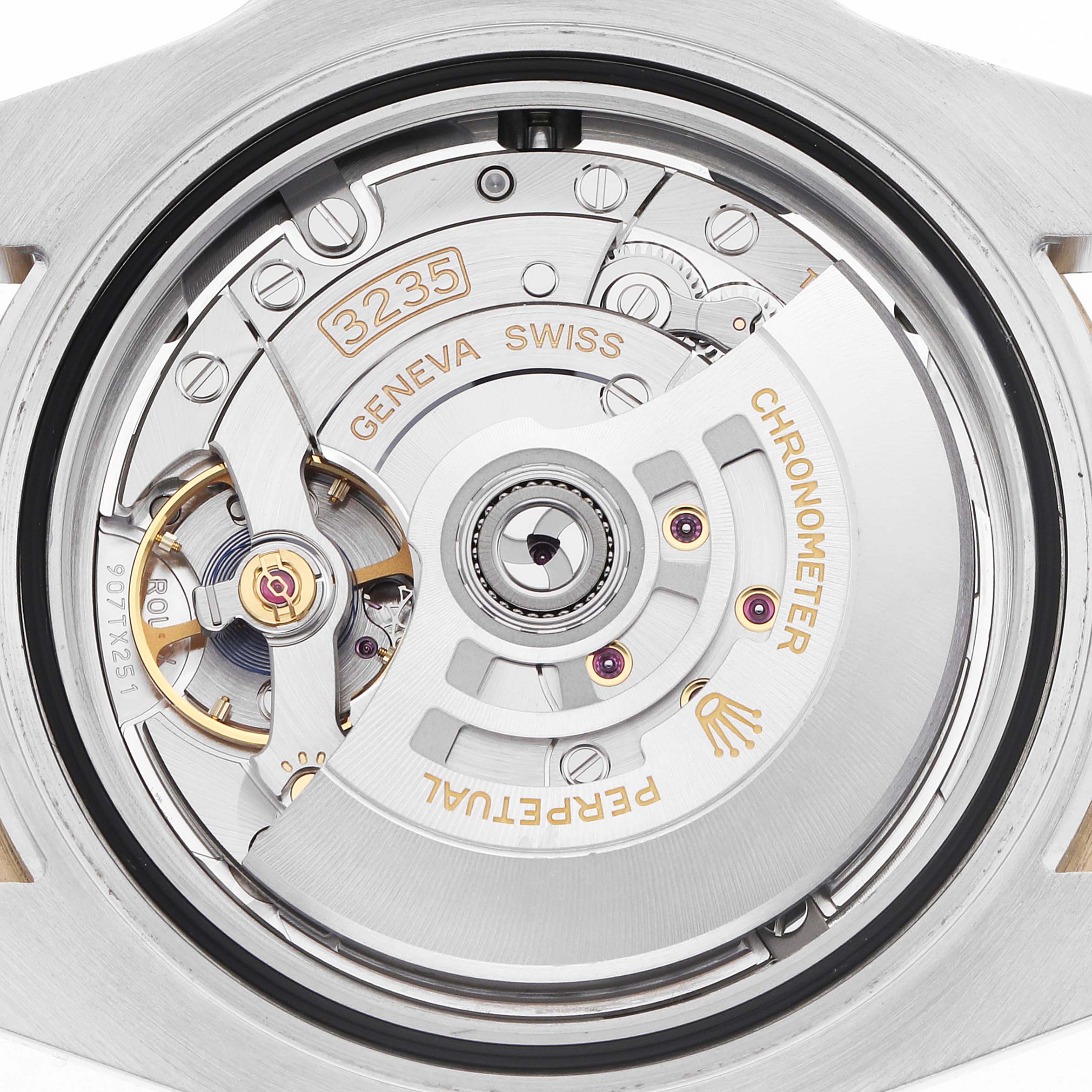 The Rolex Submariner 126613 Men
s Steel and Gold (two tone) Blue Dial image shows the movement from a top-down view, highlighting the rotor and intricate internal mechanics.