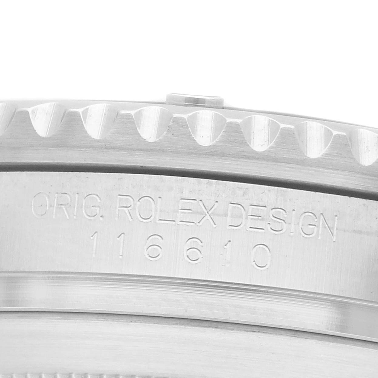 The image shows a close-up of the side of a Rolex Submariner 116610LV Men
s Stainless Steel Green Dial, highlighting the bezel and engraved model details.