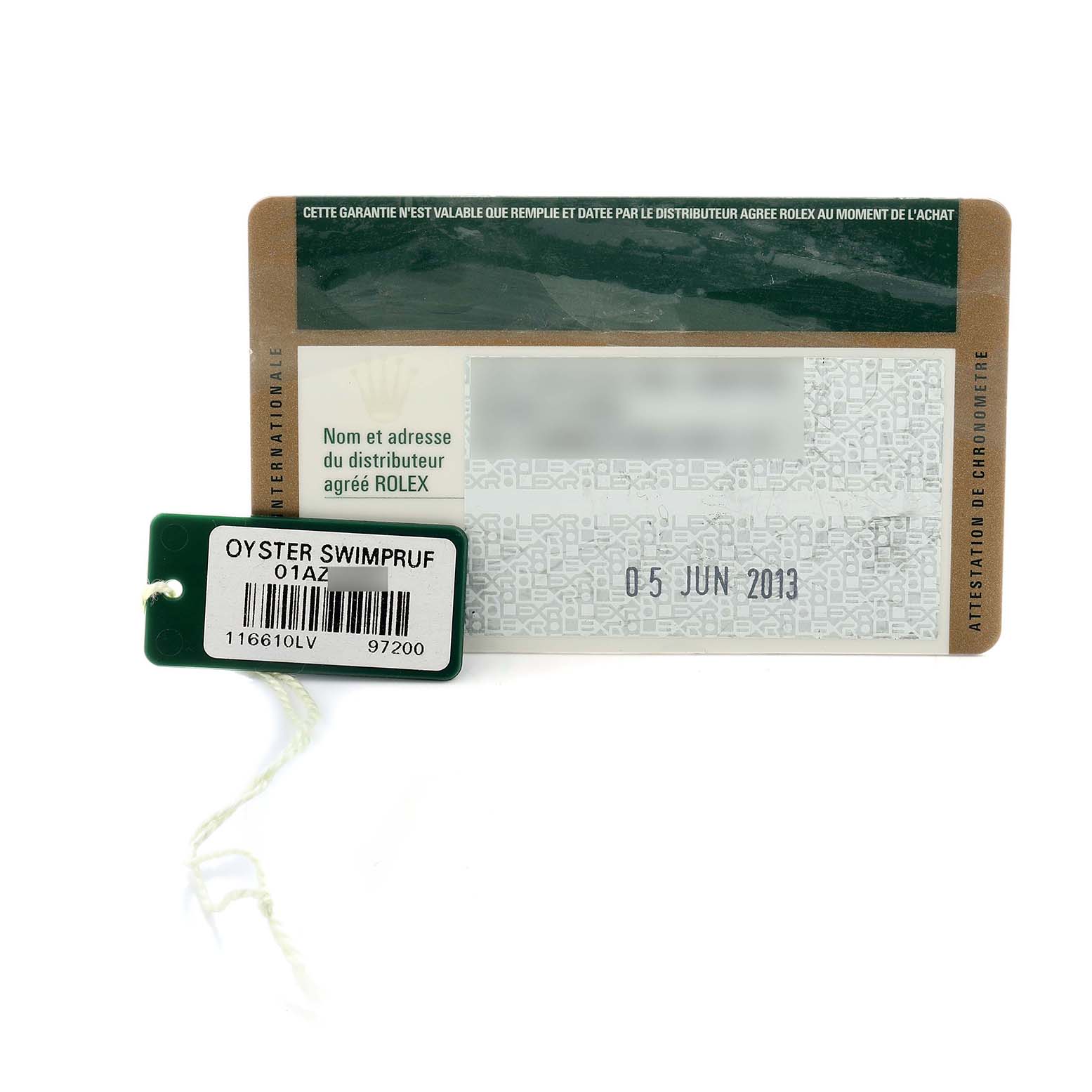The image shows a warranty card and tag for a Rolex Submariner 116610LV Men
s Stainless Steel Green Dial, model 116610LV, with the date 5 June 2013.