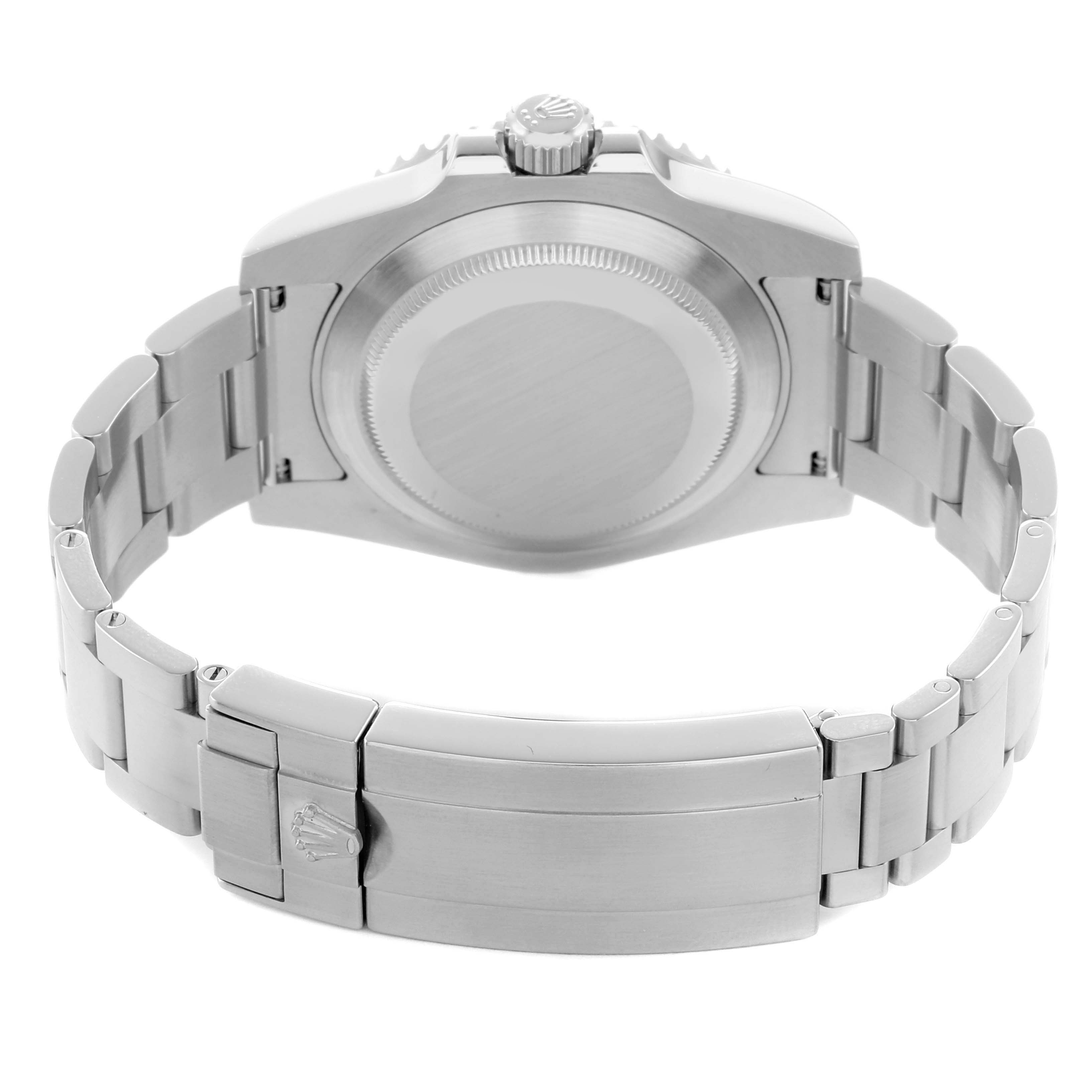 The image shows the back view of a Rolex Submariner 116610LV Men
s Stainless Steel Green Dial, highlighting its case back, bracelet, and clasp.