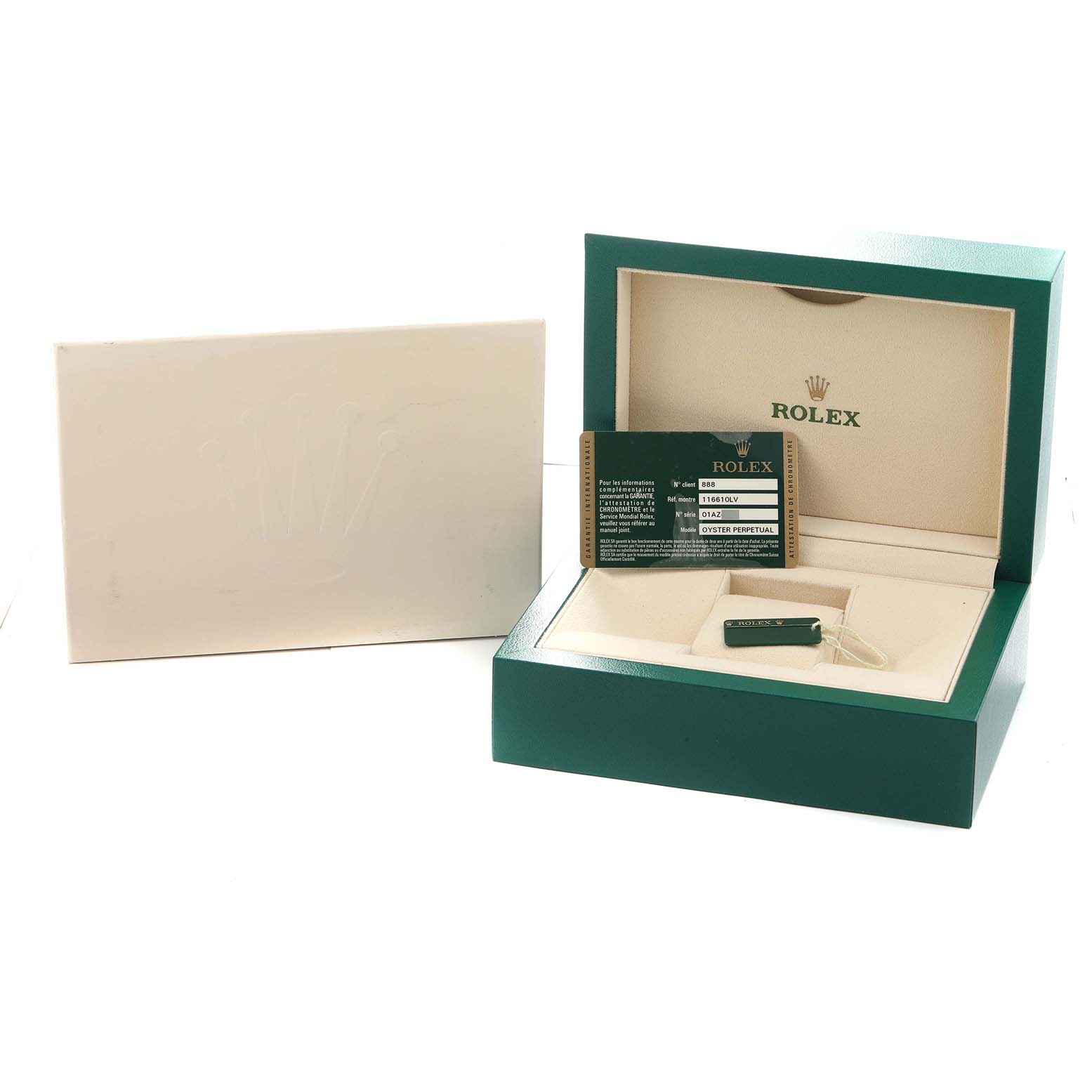 The image shows a Rolex Submariner 116610LV Men
s Stainless Steel Green Dial box, card, and tag at an angled top view, highlighting the packaging elements.