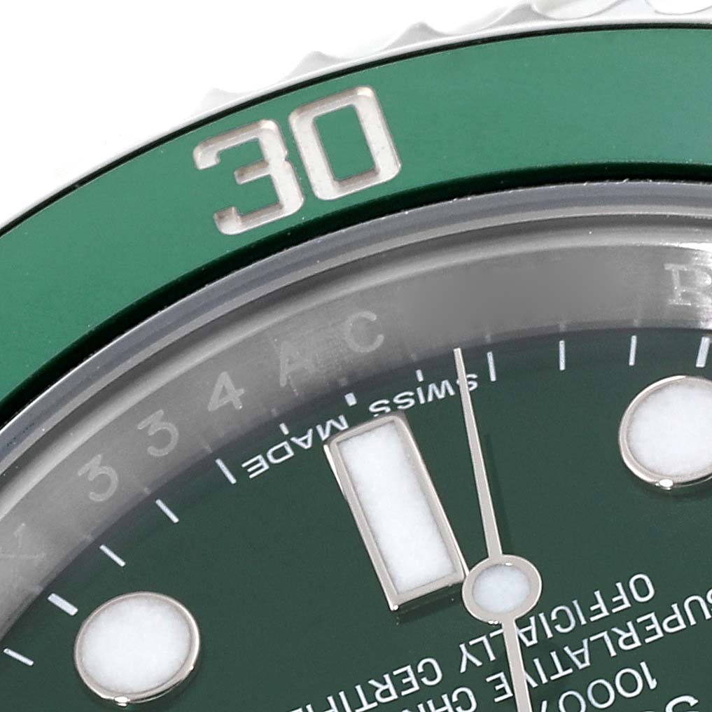 The image shows a close-up of the bezel and dial at an angle, highlighting the 30-minute marker on a Rolex Submariner 116610LV Men
s Stainless Steel Green Dial 116610LV Men
s Stainless Steel Green Dial watch.