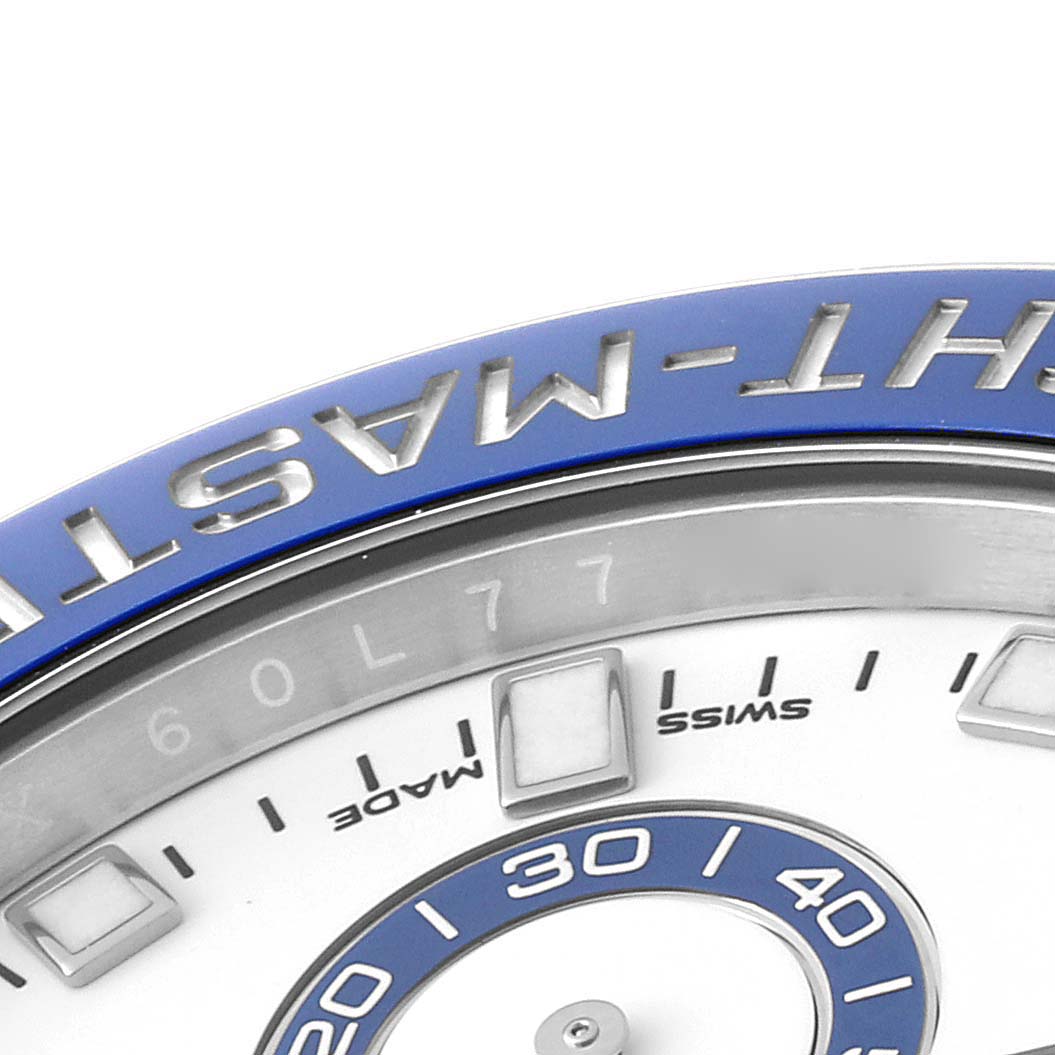 The image shows a close-up of the bezel and upper part of the dial of a Rolex Yacht-Master 116680 Men's Stainless Steel White Dial 116680 Men's Stainless Steel White Dial watch.