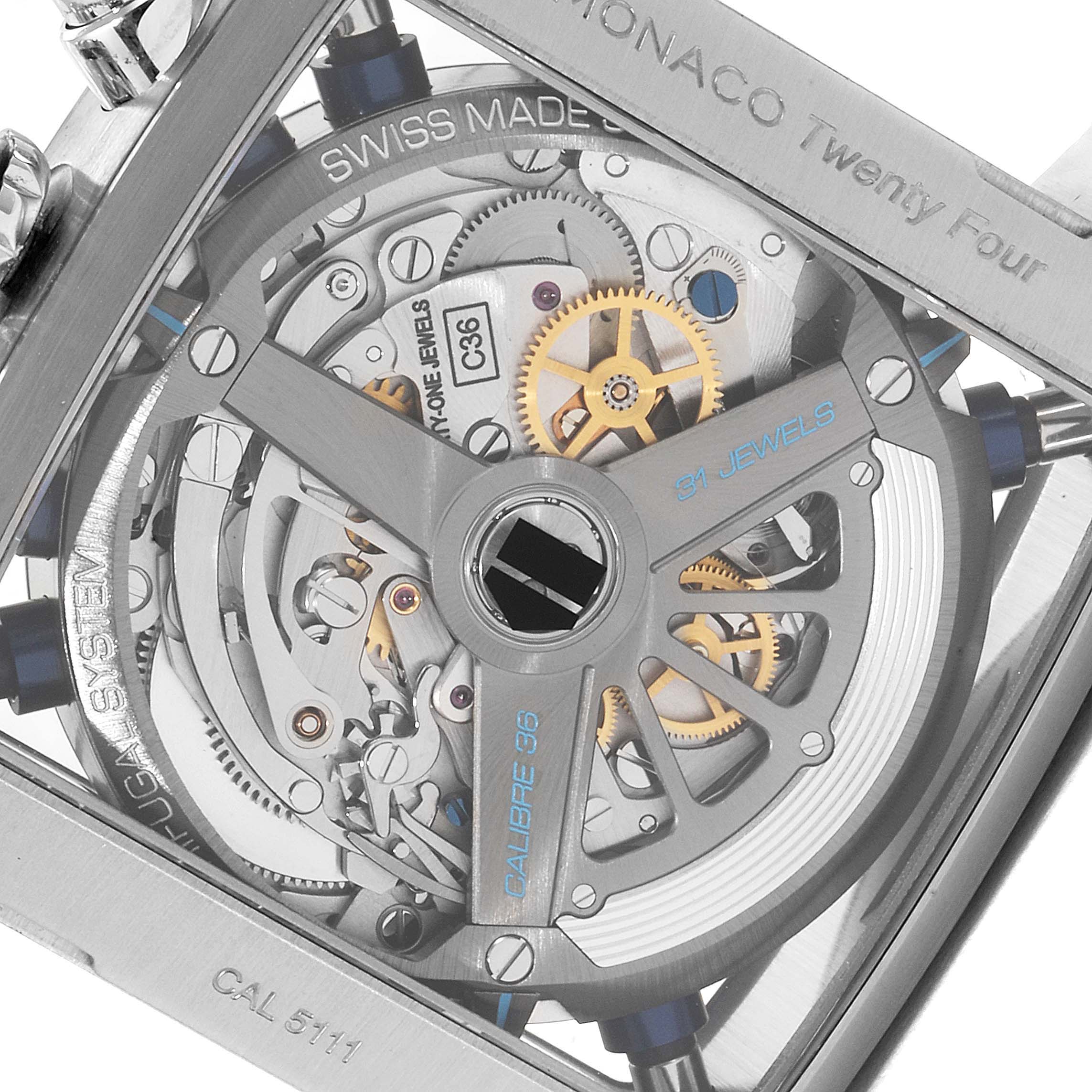 The image shows the back view of the Tag Heuer Monaco CAL5111.FC6299 Men's Stainless Steel Blue Dial CAL5111.FC6299 Men's Stainless Steel Blue Dial watch, revealing its intricate Calibre 36 movement and internal components.