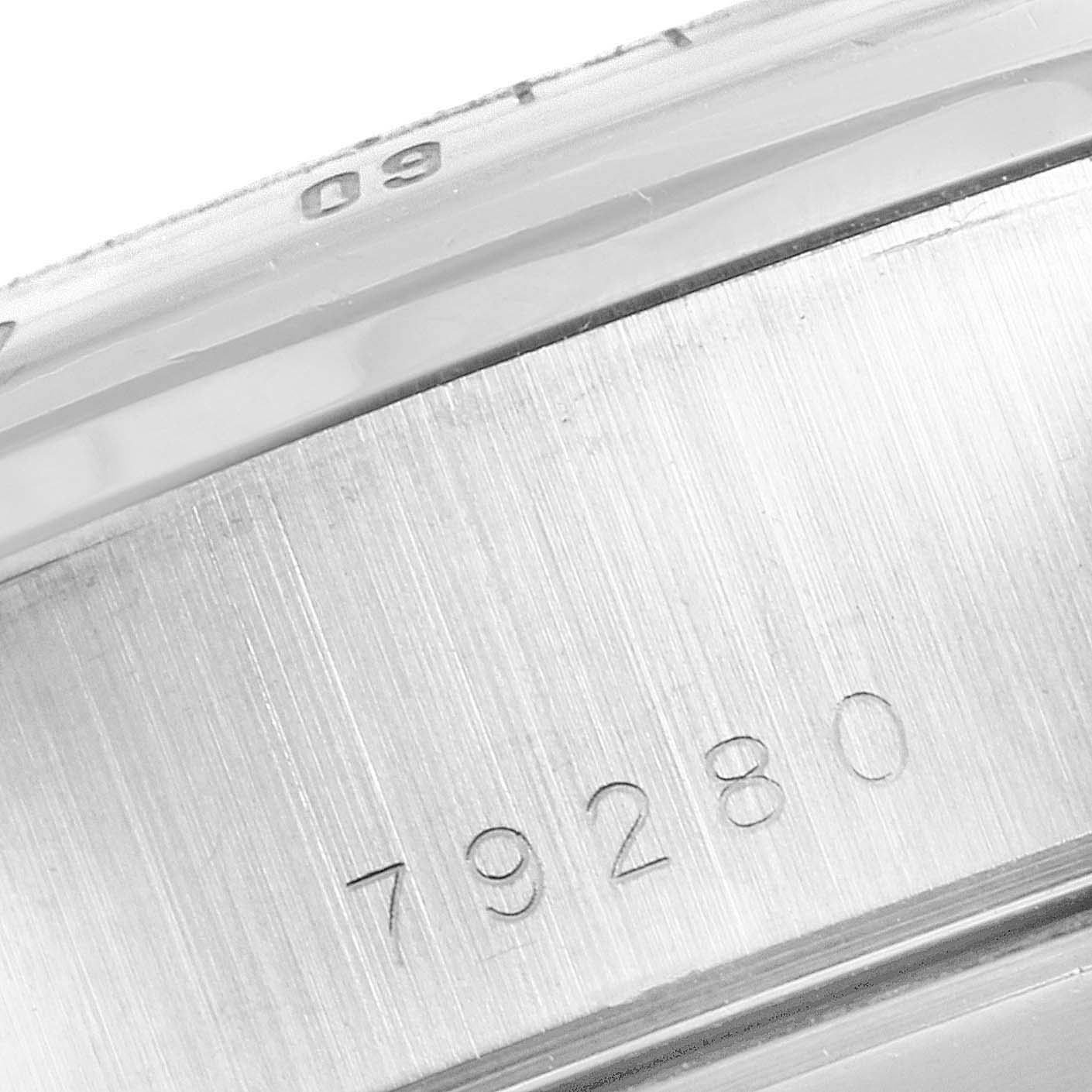 This close-up image shows the case side of a Tudor Prince 79280 Men
s Stainless Steel Silver Dial 79280 Men
s Stainless Steel Silver Dial watch, focusing on its engraved model number 79280.
