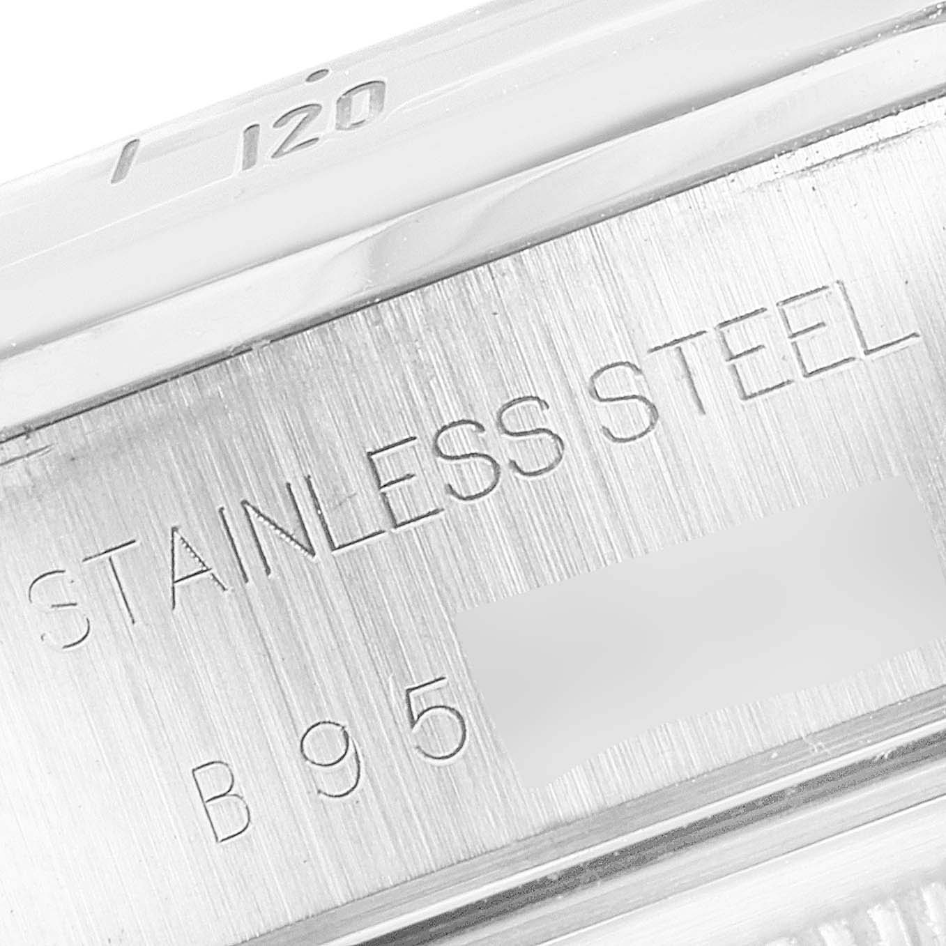 The image shows a close-up of the stainless steel case back of a Tudor Prince 79280 Men
s Stainless Steel Silver Dial 79280 Men
s Stainless Steel Silver Dial watch.