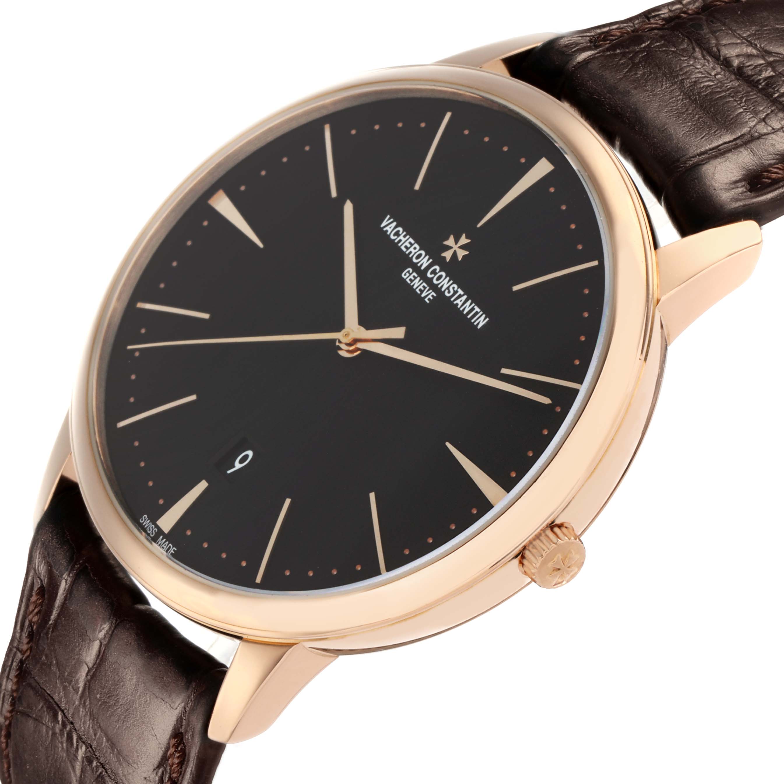 The image shows a Vacheron Constantin Patrimony 85180 Men
s Rose Gold Black Dial watch at a tilted side angle, highlighting the dial, crown, and leather strap.