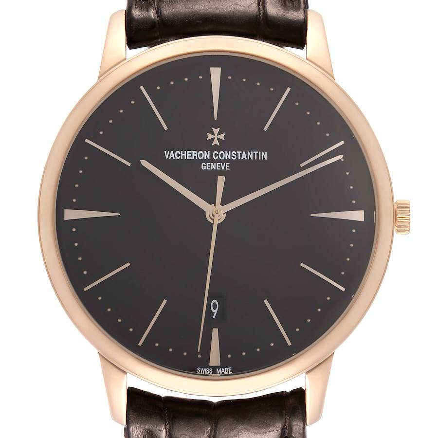 The Vacheron Constantin Patrimony 85180 Men's Rose Gold Black Dial watch is shown from a front angle, displaying its dial, hands, date window, and part of the strap.