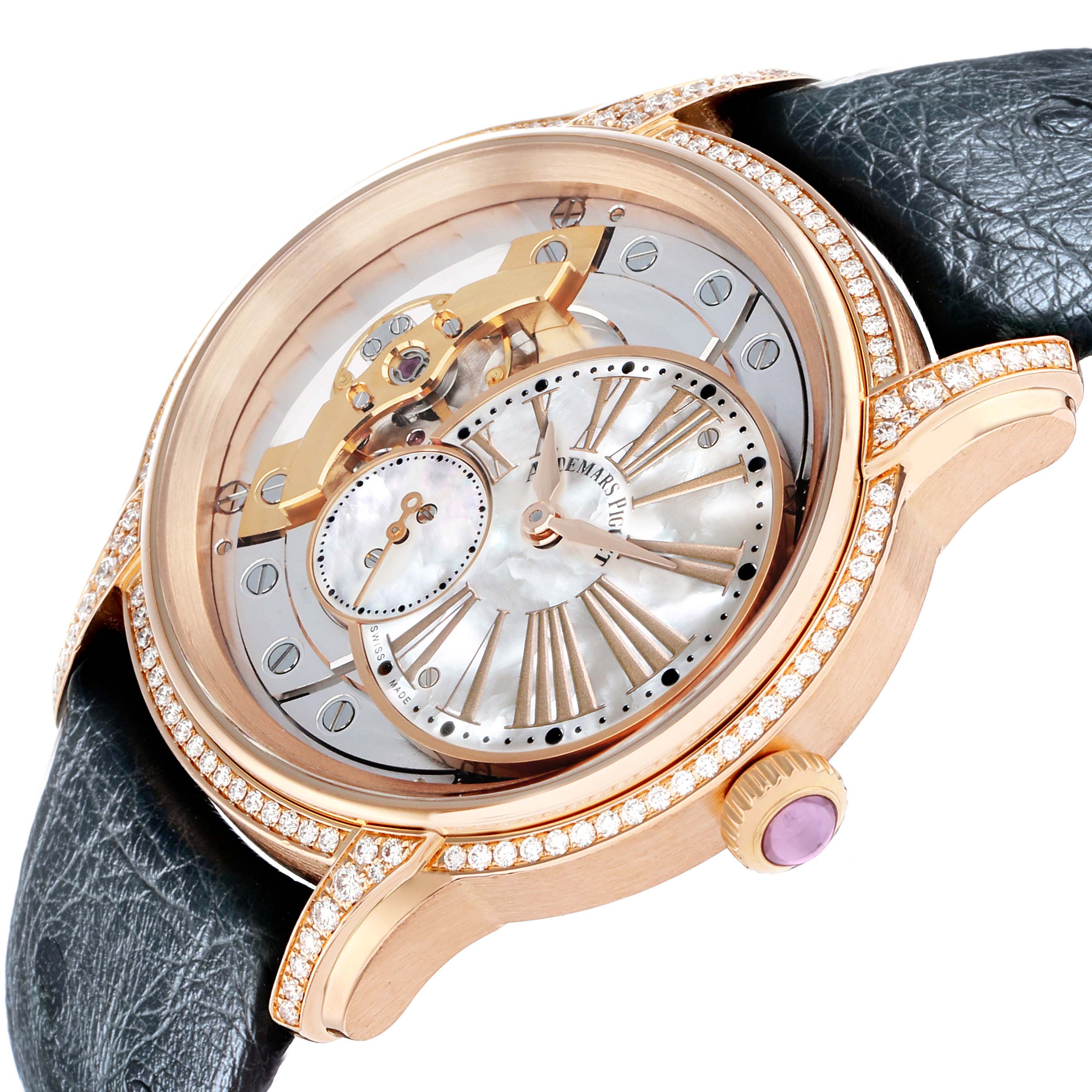 The Audemars Piguet Millenary 77247OR Women
s Rose Gold Mother of Pearl Dial watch is shown at an angle highlighting its oval case, visible mechanics, leather strap, and diamond detailing.