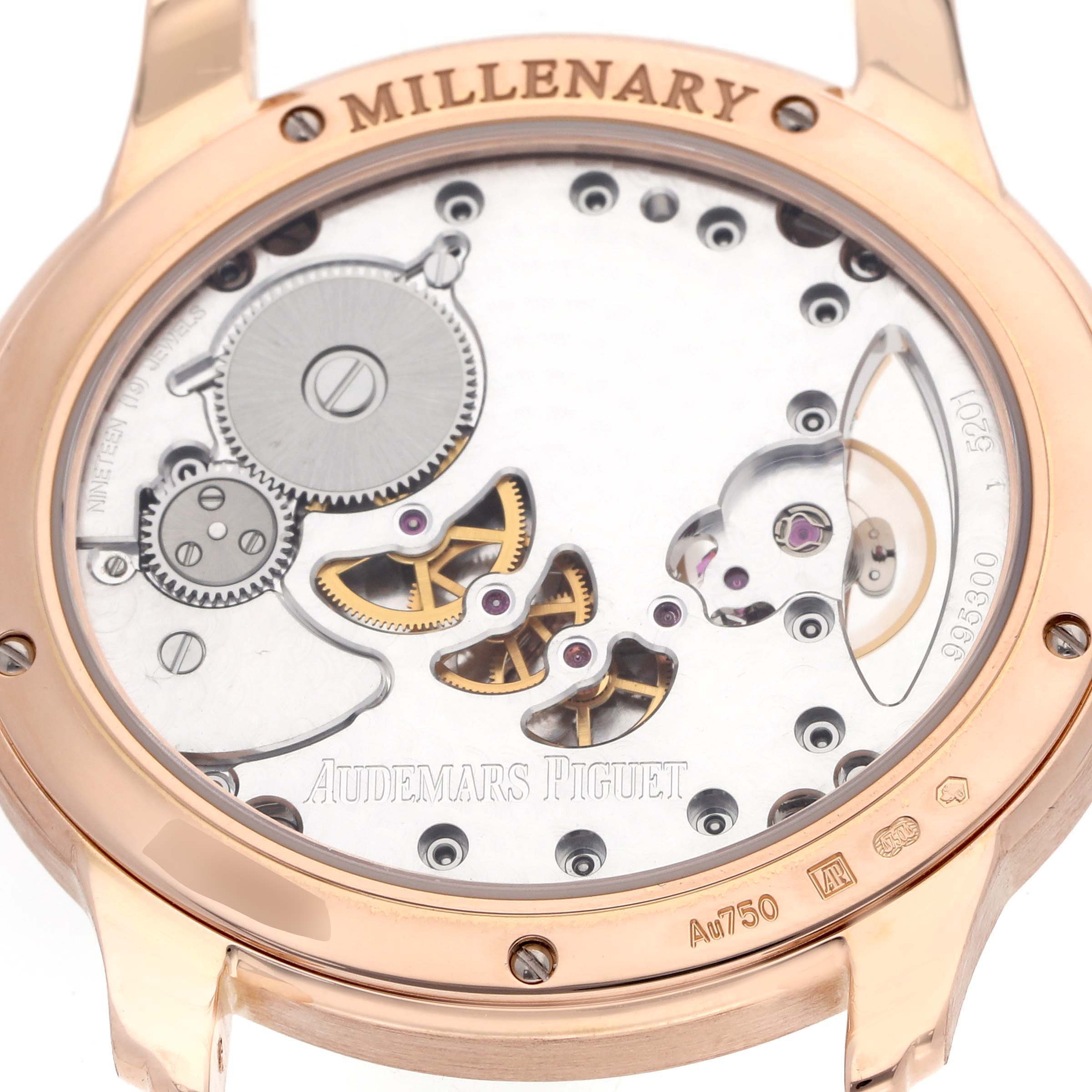 The image shows the back view of an Audemars Piguet Millenary 77247OR Women
s Rose Gold Mother of Pearl Dial watch, highlighting its exposed mechanical movement.