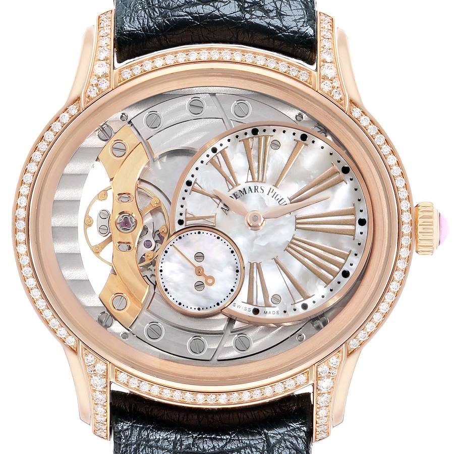 The image shows a front view of the Audemars Piguet Millenary 77247OR Women's Rose Gold Mother of Pearl Dial model, showcasing its openwork dial, Roman numerals, and diamond bezel.