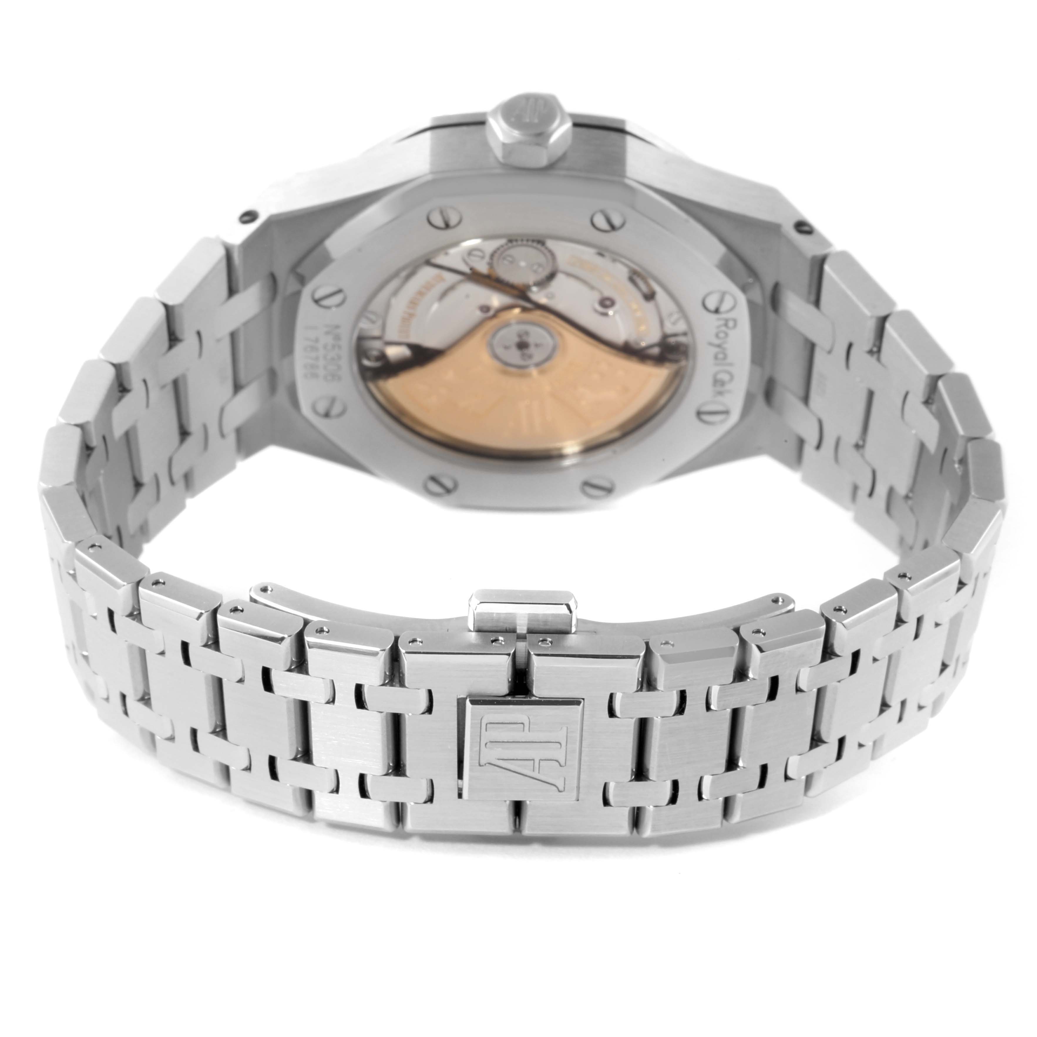 The image shows a rear view of a Royal Oak watch by Audemars Piguet, highlighting the case back and metal bracelet.