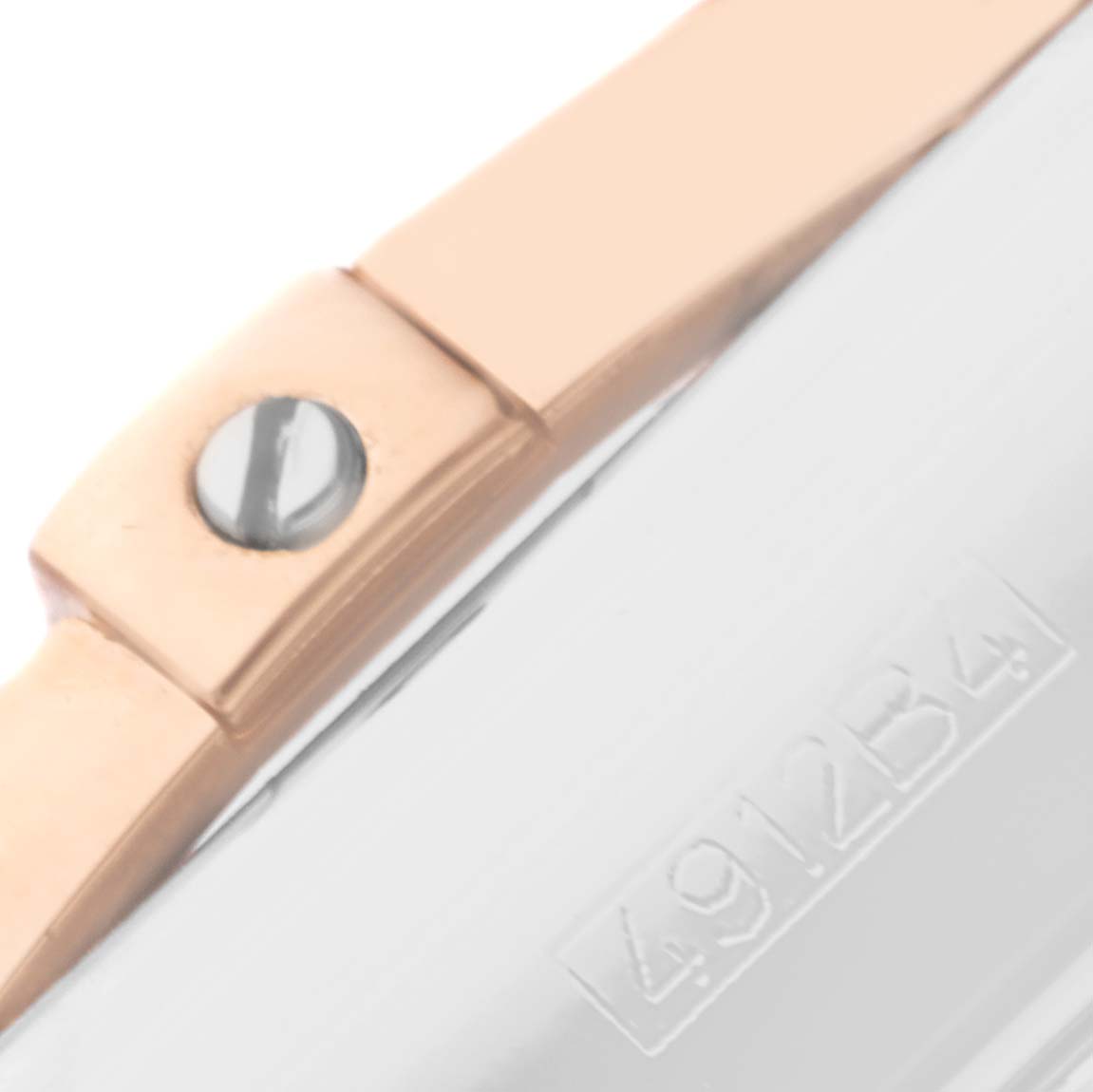 The image shows a close-up of the bracelet link and part of the clasp with a serial number of the Breitling Chronomat CB0110 Men's Steel and Gold (two tone) Black Dial CB0110 Men's Steel and Gold (two tone) Black Dial watch.